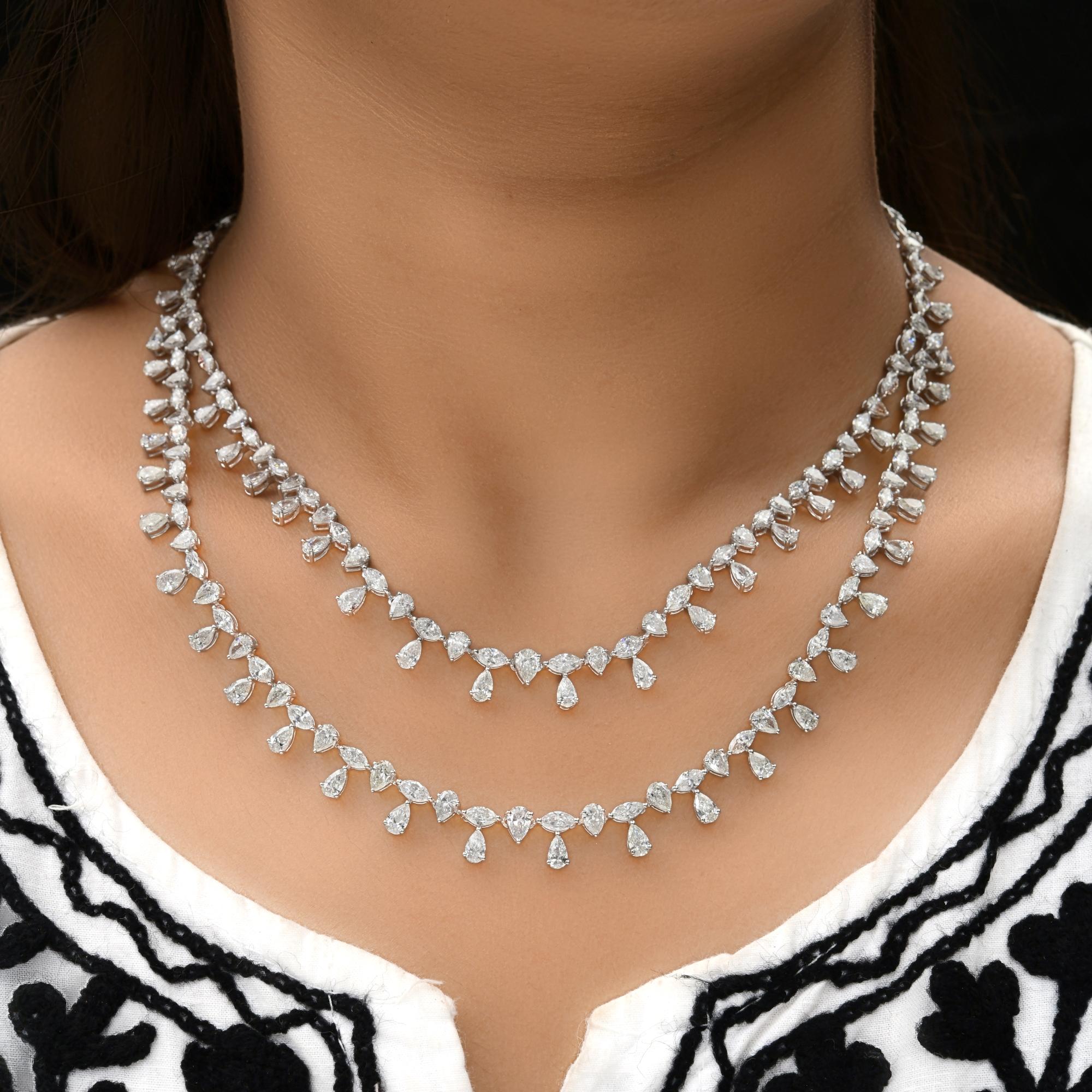 Statement 21.85Ct Mixed Cut Natural Diamond Double Layer Necklace 18K Solid Gold.
This design features two layers of diamond drops arranged in a rhythmic, cascading pattern. Each pear-shaped diamond gracefully dangles from a brilliant-cut base,
