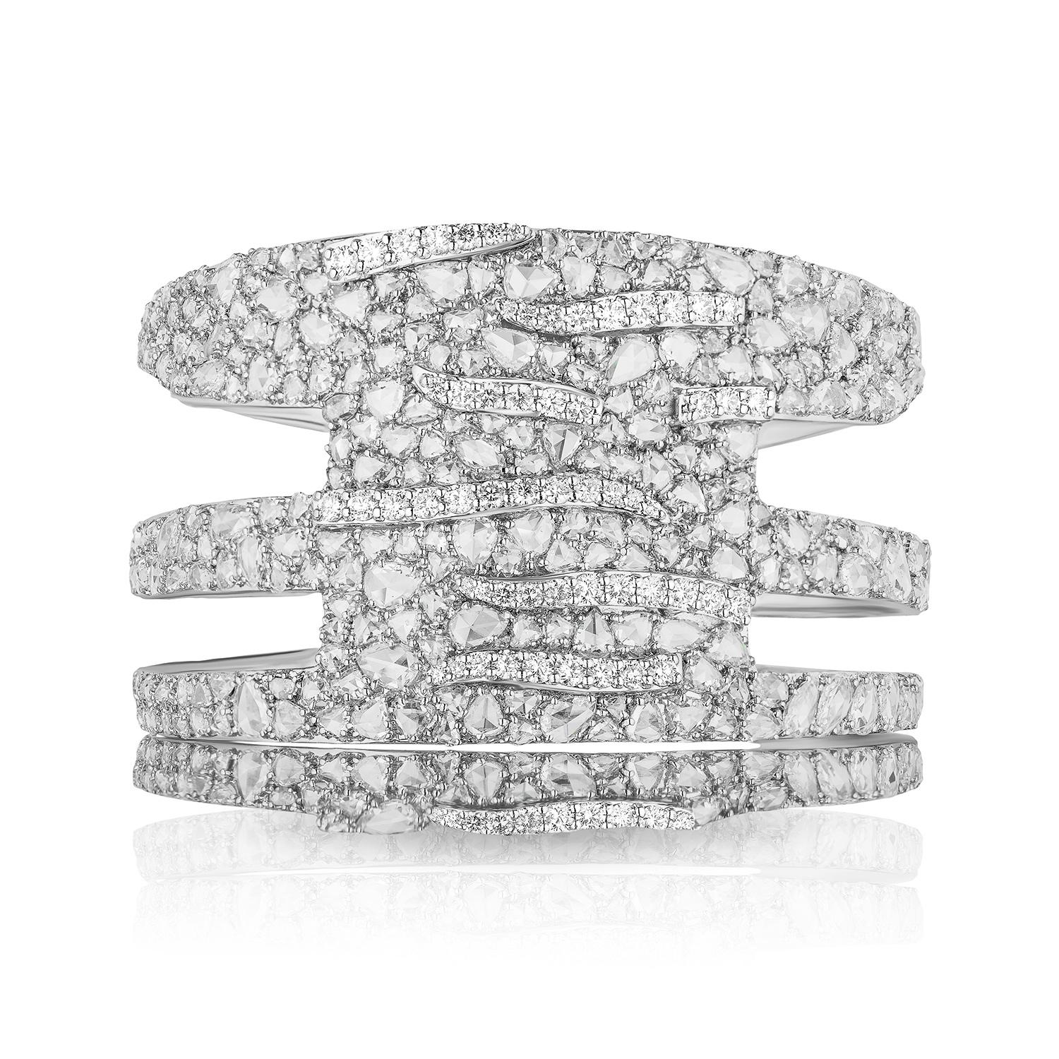 Beautiful and Unique Wide Cuff Bangle.

Features Various shaped Rose Cut Diamonds set in a free form style with abstract lines of modern round brilliant diamonds. 

Modern artistry of nature coming together to interpret the flowing lines of a white