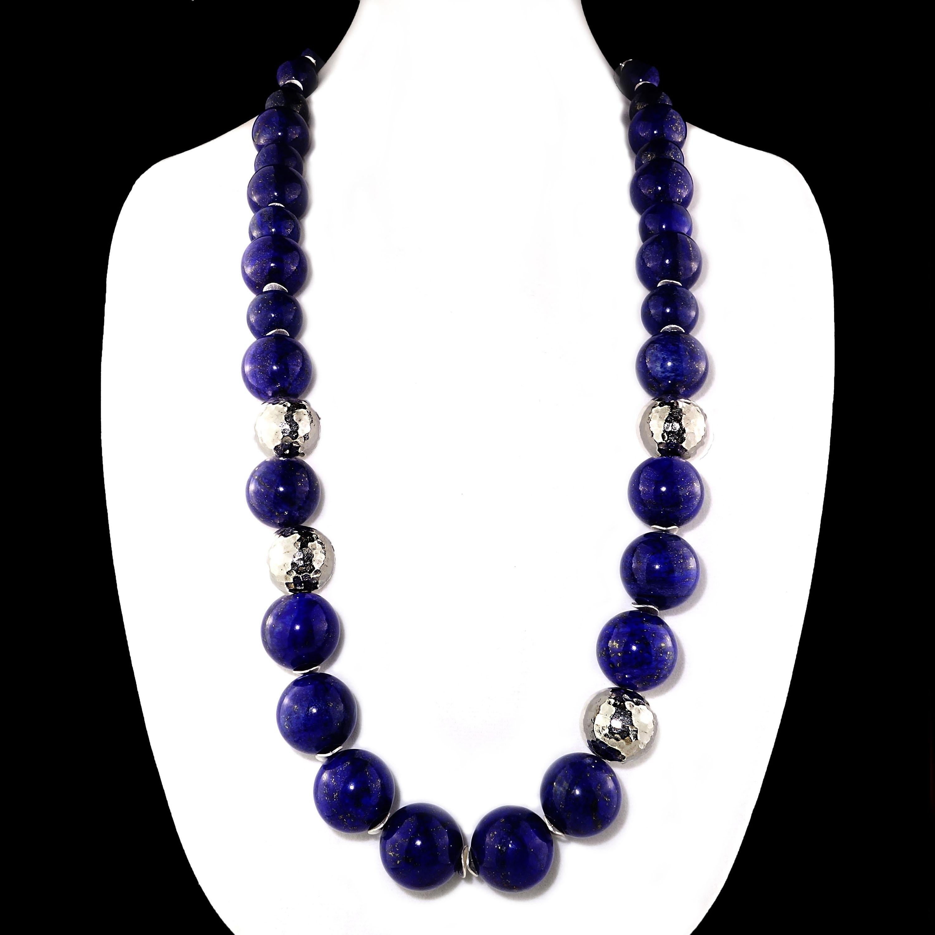 Fabulous 36 inch custom made necklace in Lapis Lazuli with four  pure Silver accents.  This one of a kind necklace features gorgeous Lapis Lazuli in three sizes, 22MM, 18MM, and 10MM, with accents of 20MM faceted pure Silver.  Silver tone flutters