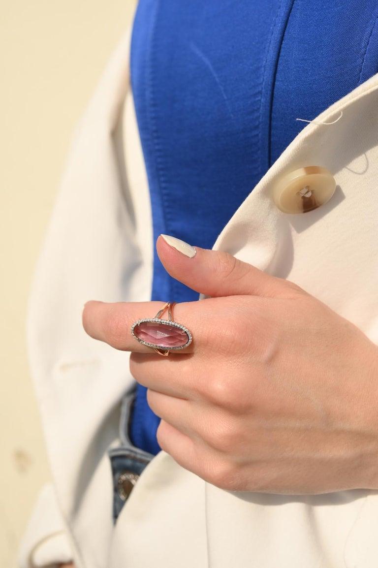 Statement Amethyst Ring with Diamonds featuring natural amethyst of 5.73 carats and diamonds of 0.18 carat. The gorgeous handcrafted ring goes with every style.
Amethyst helps to relieve stress and anxiety in your life. 
Designed with big pear cut