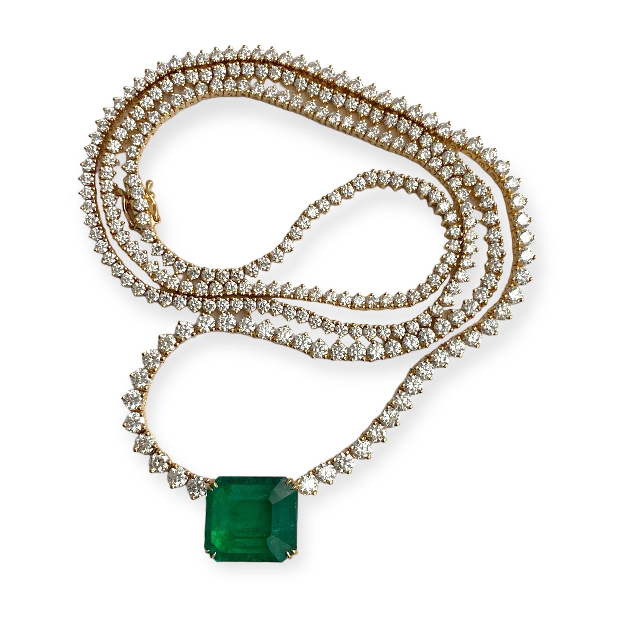 Significant 6.5 ct Emerald-cut Emerald pendant on a 24-inch, graduated Diamond necklace with 11ct all-around Diamonds set in 18k yellow gold.

This design is also available in  4 ct Emerald and 5ct half Diamond, half chain necklace.  