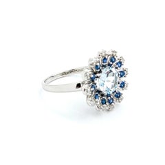 Anello dichiarato con acquamarina e zaffiro in oro bianco 10k