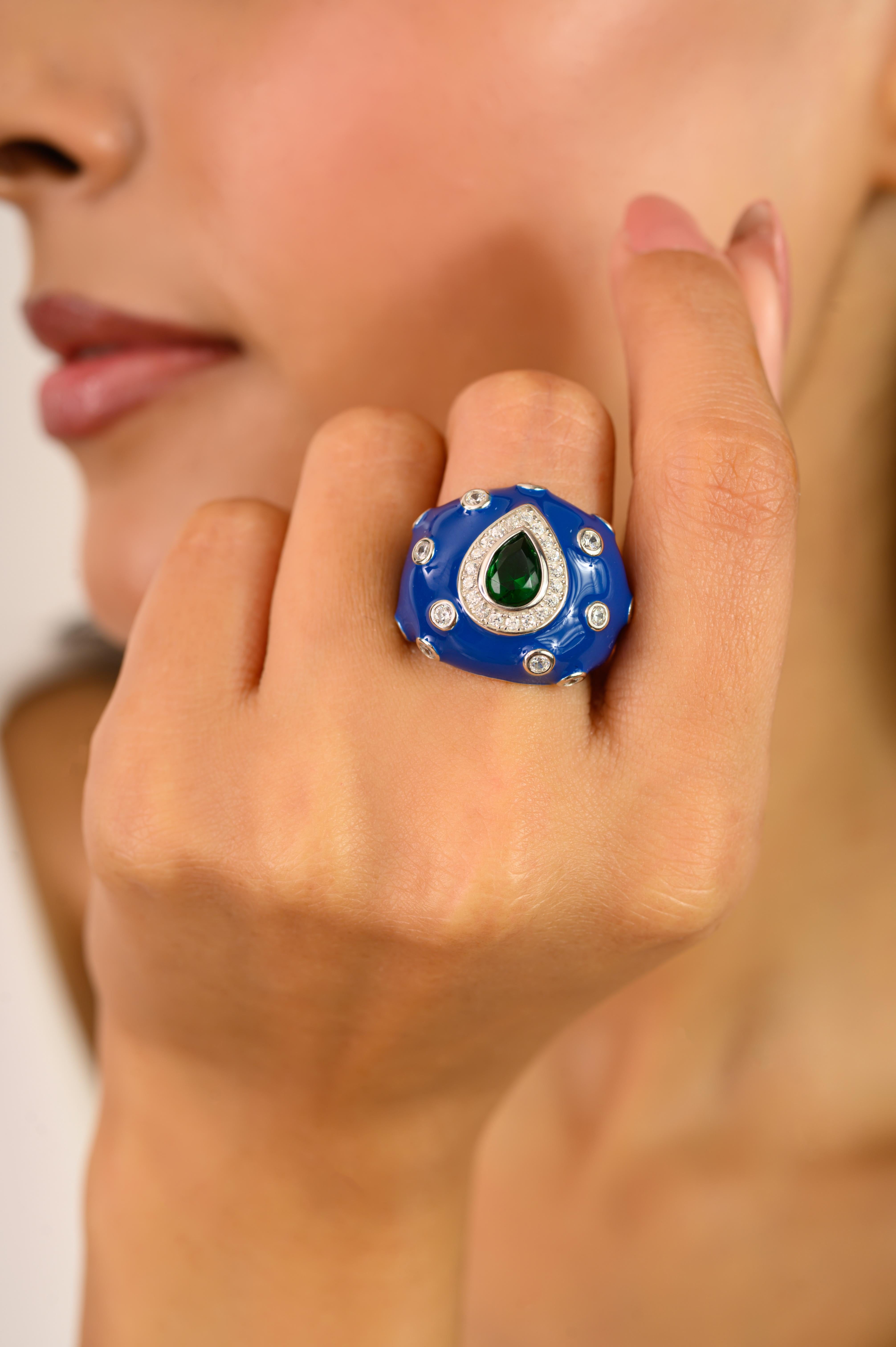 in vendita:  Anello d'argento con smalto blu e pietre bianche e verdi Gioielleria 2