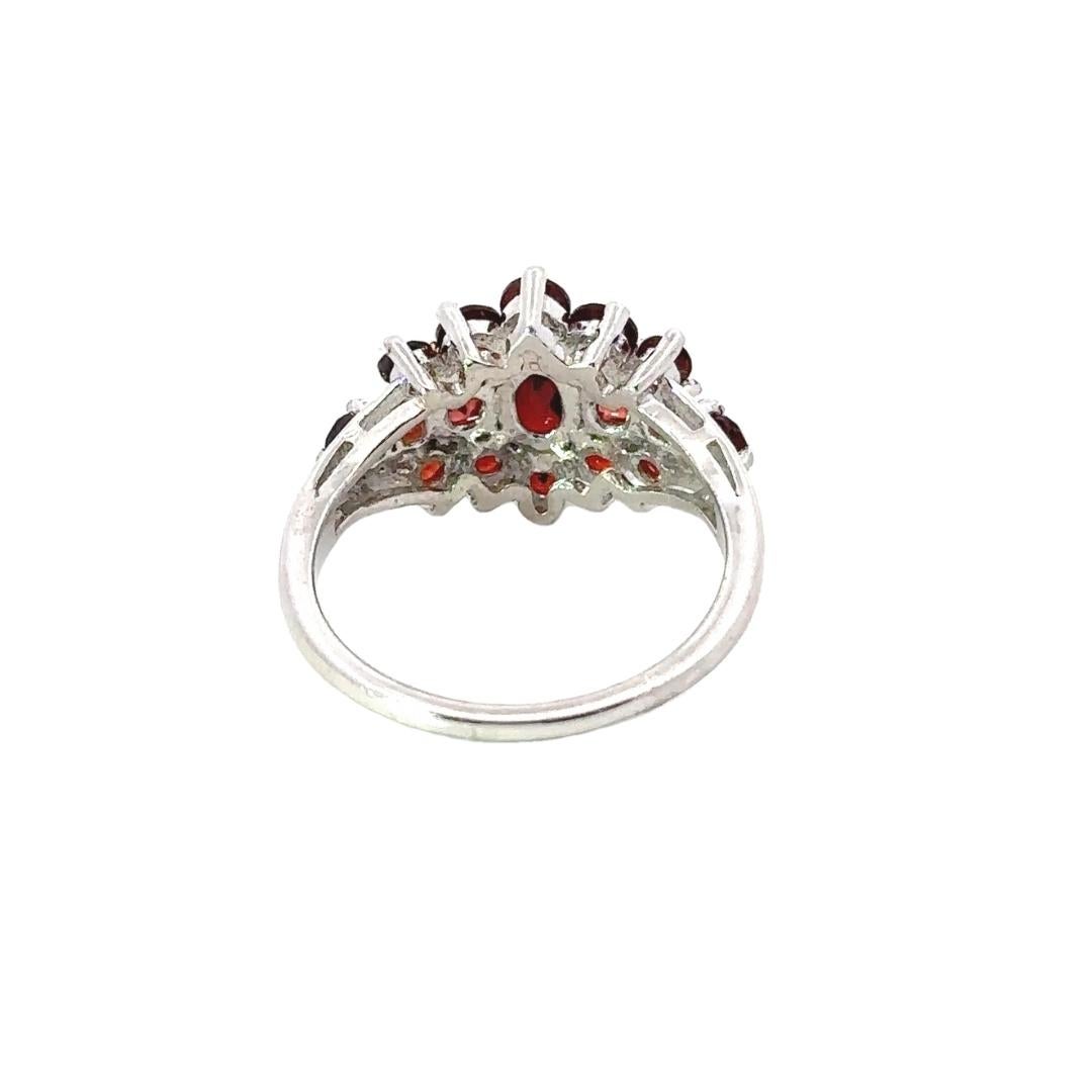 in vendita:  Anello promessa con granato rosso intenso per la mamma, in argento 925 7