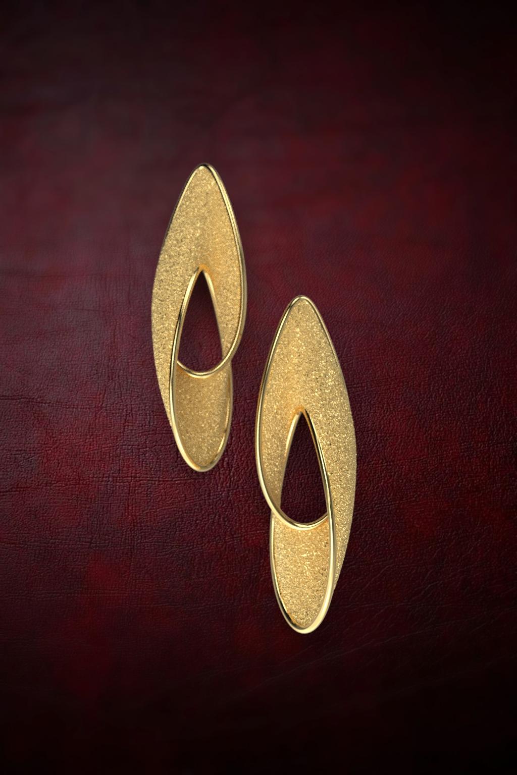 Made to order 14k yellow gold earrings.
Contemporary Statement Earrings in solid gold 14k,  Italian fine jewelry made in Italy, long stud earring, modern and elegant earrings.
Length: 39 Millimeters; Width: 11.5 Millimeters
The earrings are secured