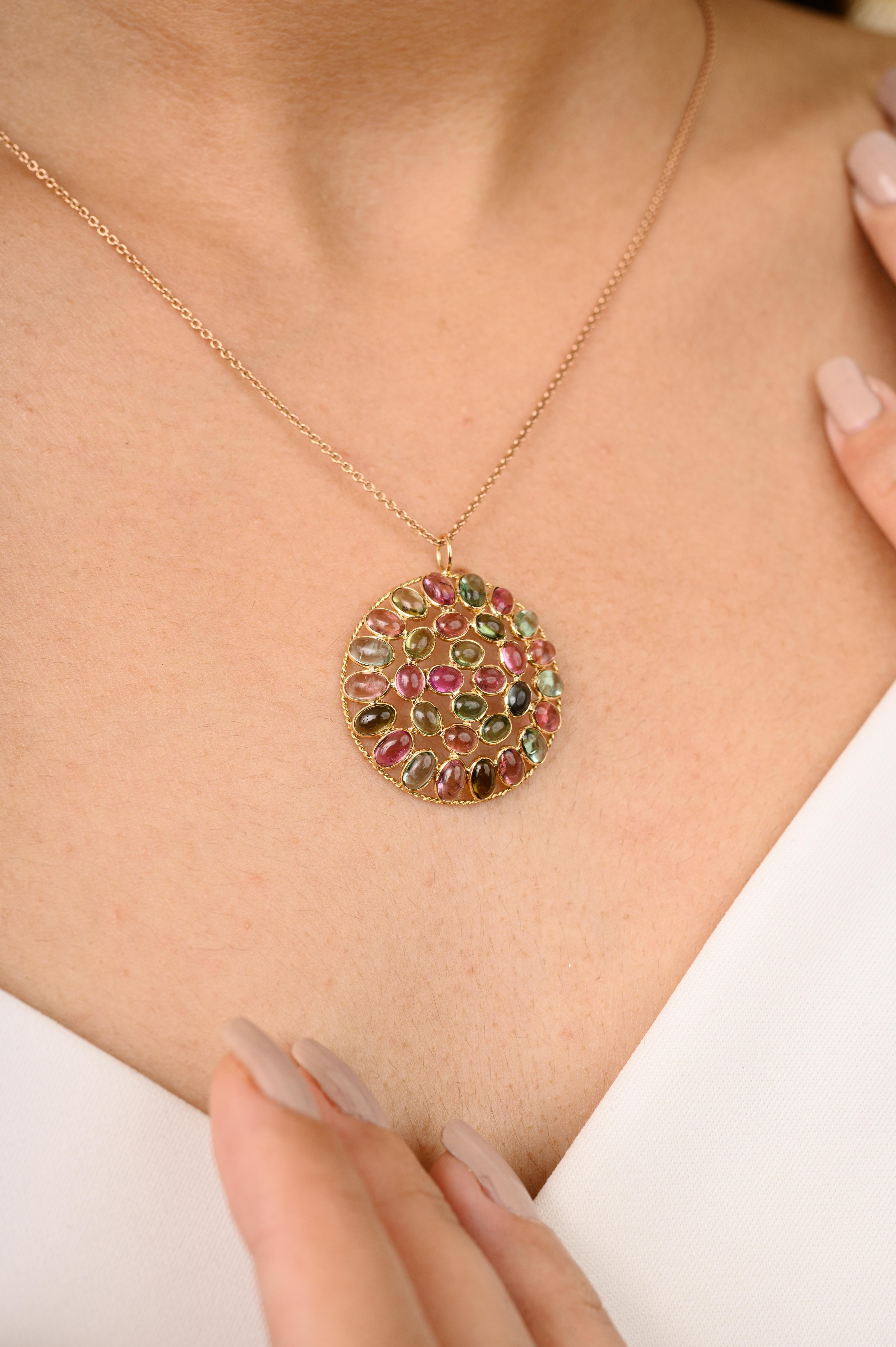 Statement Multi Tourmaline Round Shape Pendant in 18K Gold studded with tourmalines. This stunning piece of jewelry instantly elevates a casual look or dressy outfit. 
Tourmaline creates a shield and prevents negative energies from