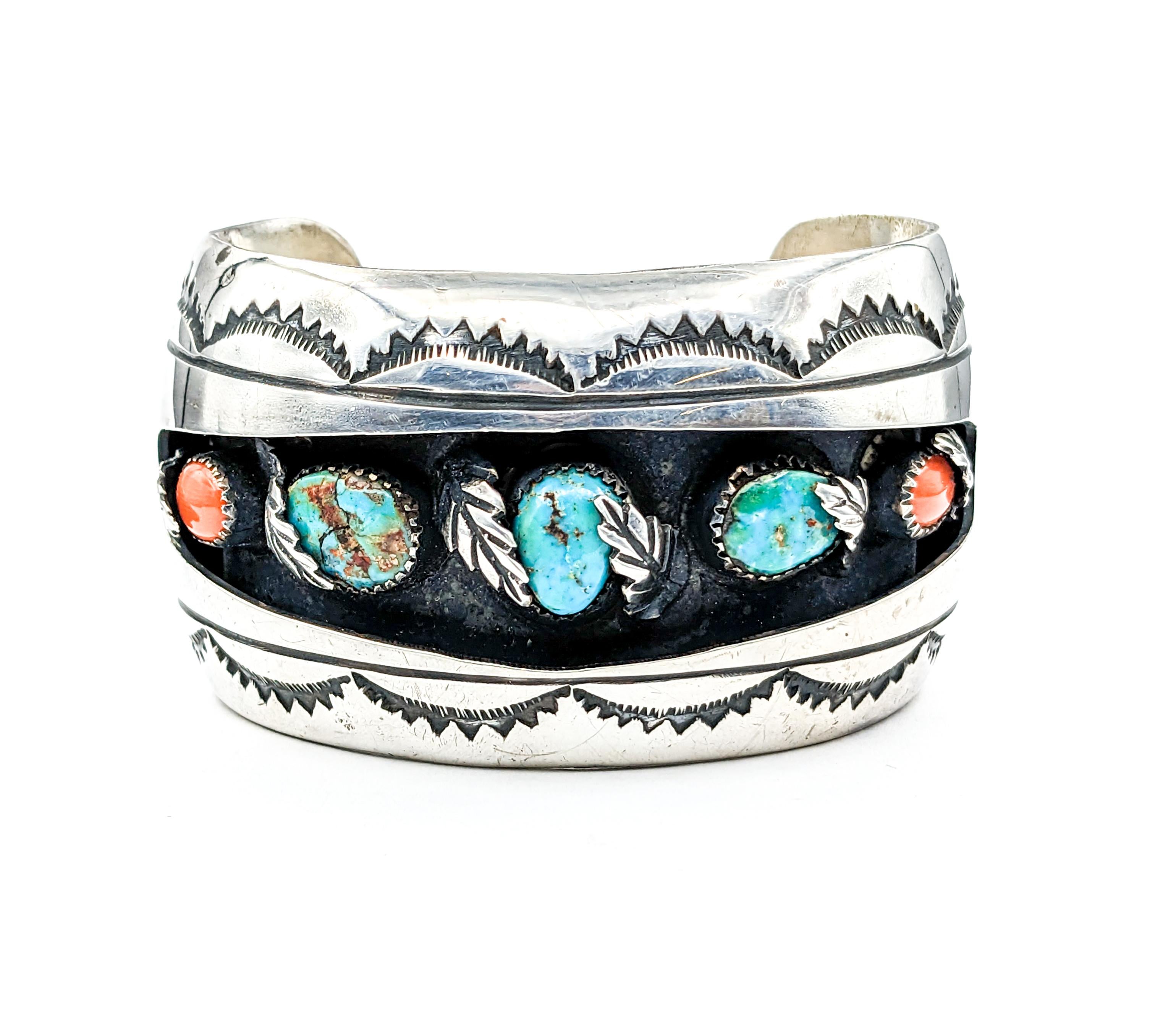 Statement Navajo Turquoise & Coral Cuff Bracelet in Sterling Silver 

Unveil the beauty of tradition with our stunning Navajo cuff bracelet, exquisitely crafted in premium sterling silver. This piece isn't just a bracelet; it's a celebration of