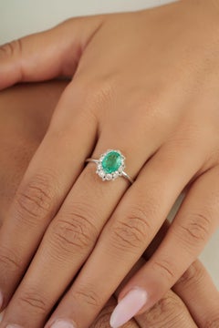 Statement Oval Emerald & Diamond Cluster Halo Engagement Ring in 14K White Gold