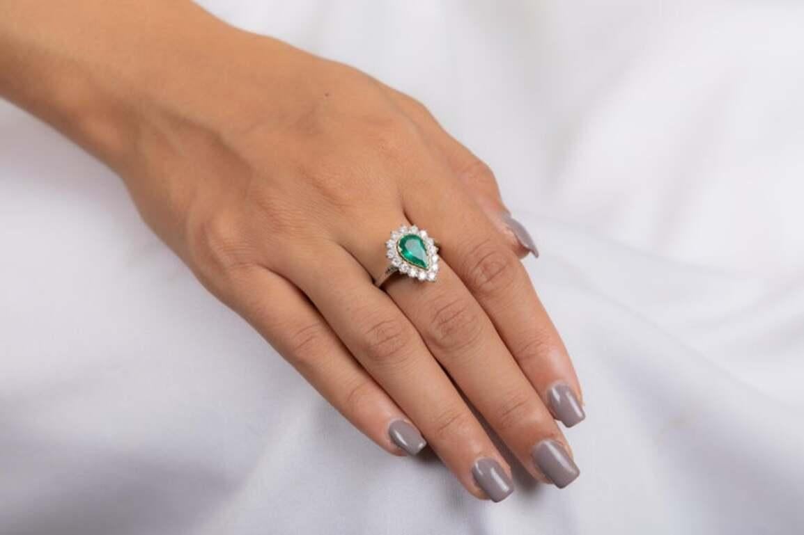 For Sale:  Statement Pear Emerald Halo Engagement Ring with Diamonds in 18k White Gold 9
