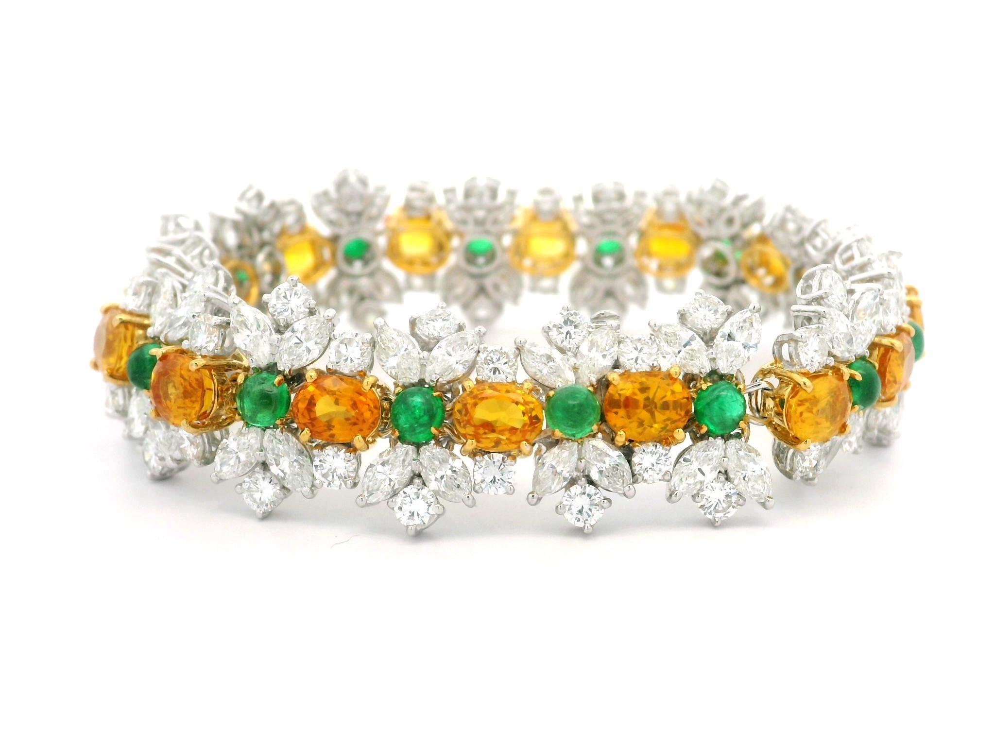 --Stone(s):--
16 Natural Genuine Sapphires - Oval Cut - Prong Set - Yellow Orange Color - Ceylon - Heated - 15.33ctw (exact)
*See Certification Details Below For More Info*
16 Natural Genuine Emeralds - Round Cabochon Cut - Prong Set - Vivid Green