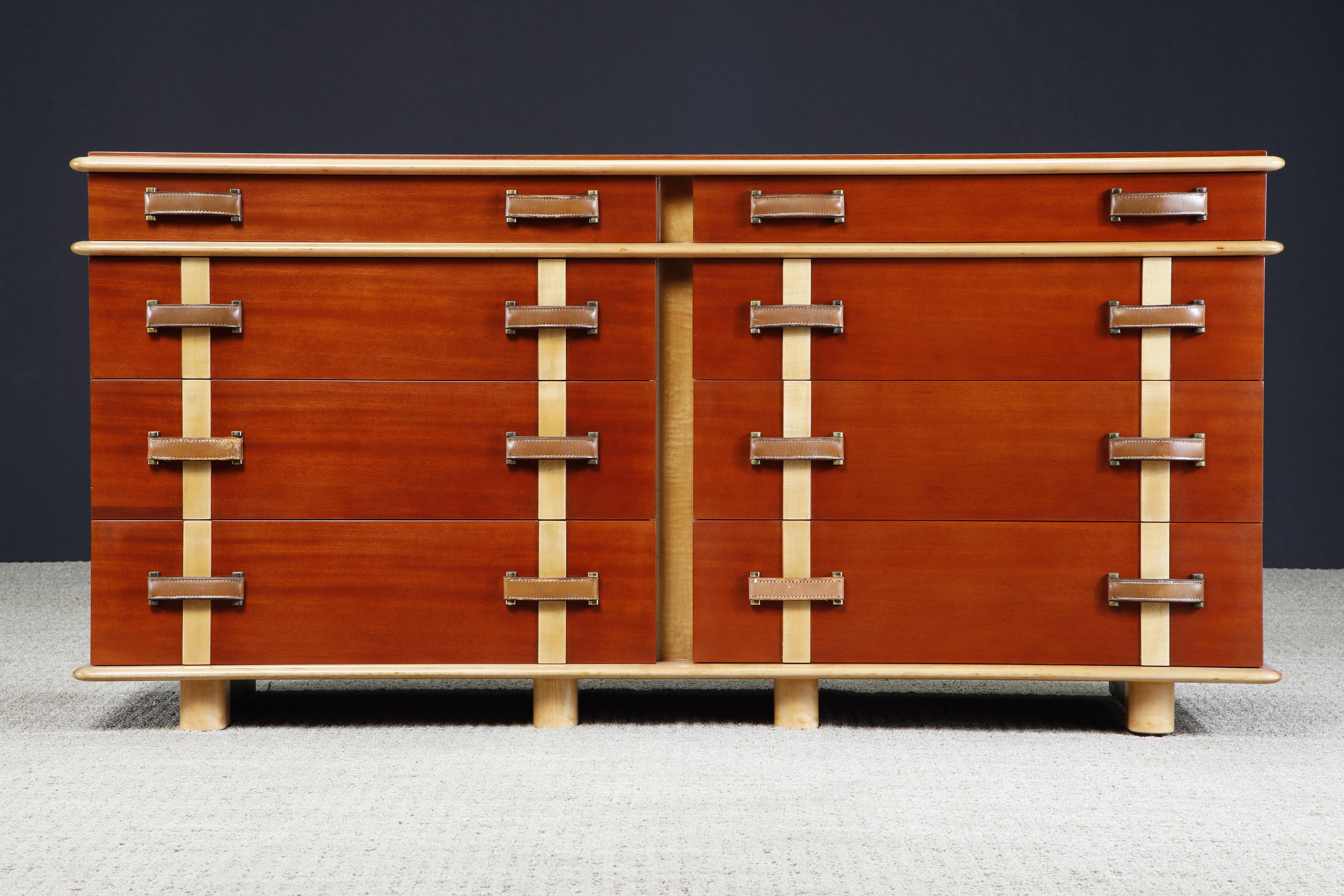 This rare collectors piece is by Paul T. Frankl for Johnson Furniture, circa 1945, and from the 'Station Wagon' series of bedroom furniture. Beautifully contrasting Mahogany and Maple refinished with an expensive French Polish; for the best of both