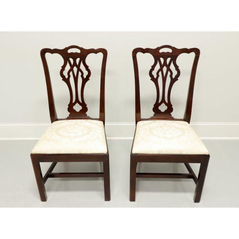 A pair of Chippendale style dining side chairs by Statton Furniture. Solid cherry wood with 