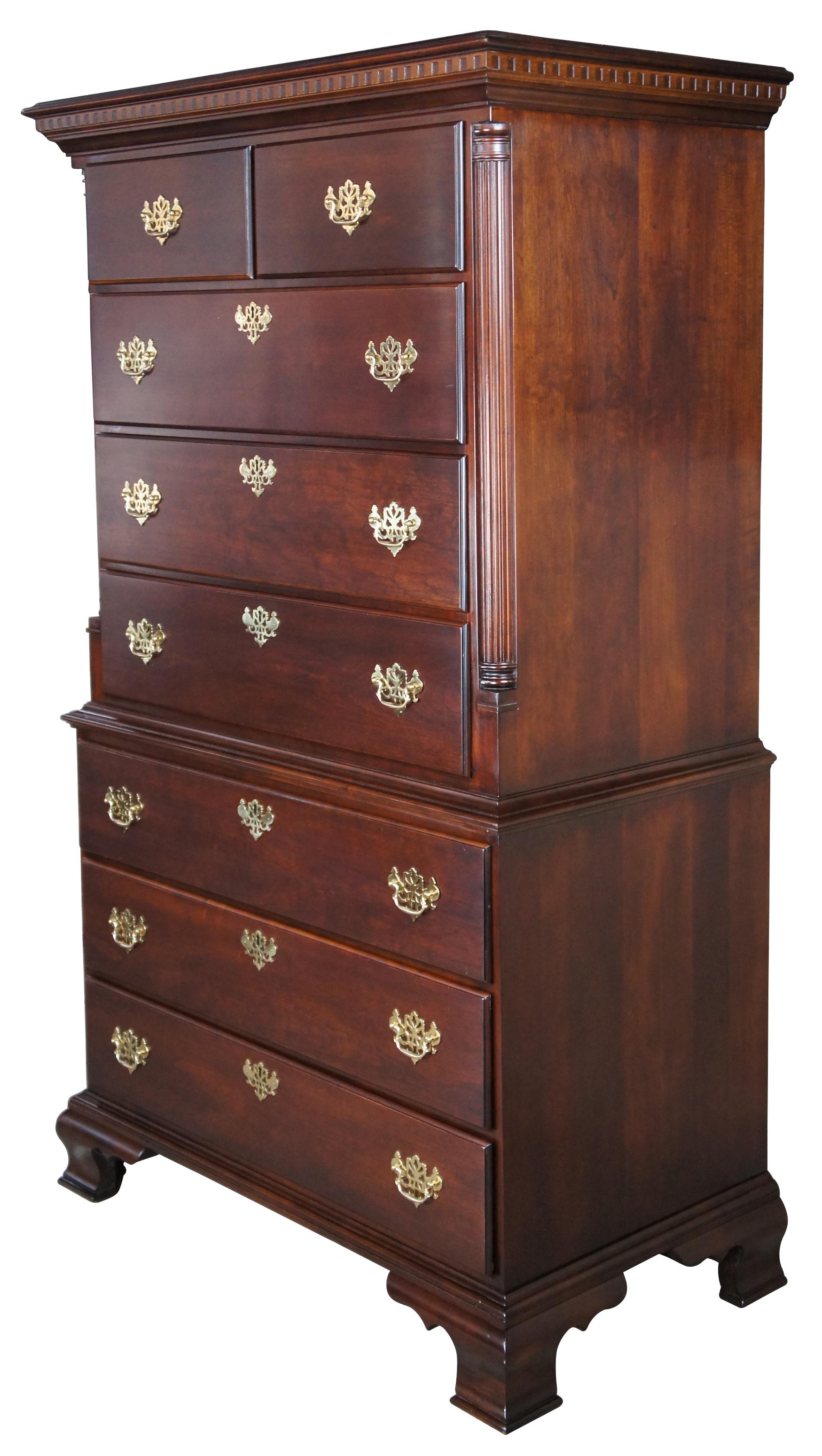 Vintage Statton Trutype Americana Old Towne highboy / tallboy chest or dresser, circa last quarter 20th century. Made of solid cherry featuring a chest or chest style with seven drawers, quarter cut fluted columns, dentil molding, brass hardware,