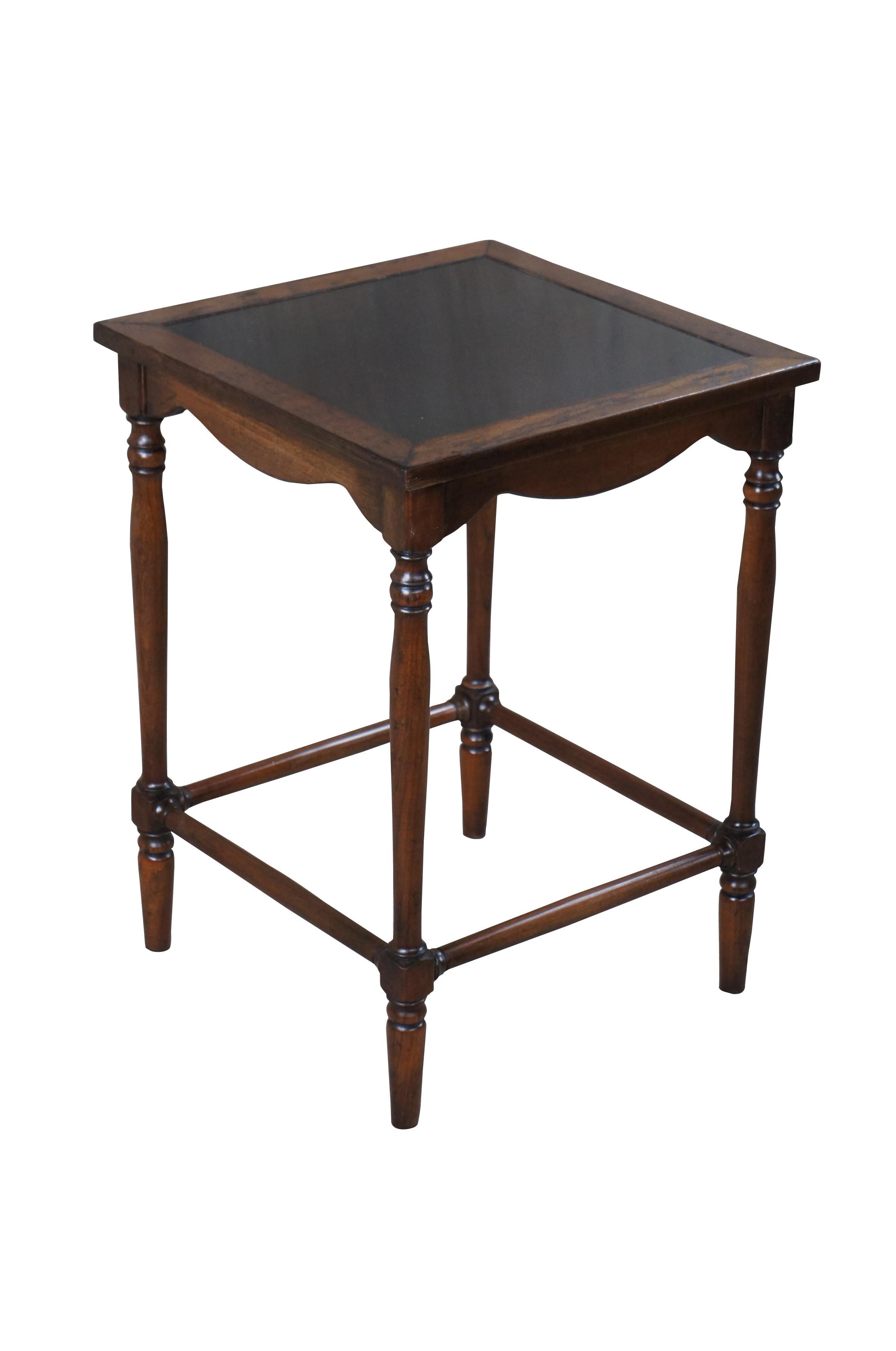 Vintage Statton Trutype Americana collection side table or plant stand.  Made of oak featuring turned supports with a black formica inset top.

Statton Furniture was a staple in Fine Furniture stores across the country. Their elegant, Made in