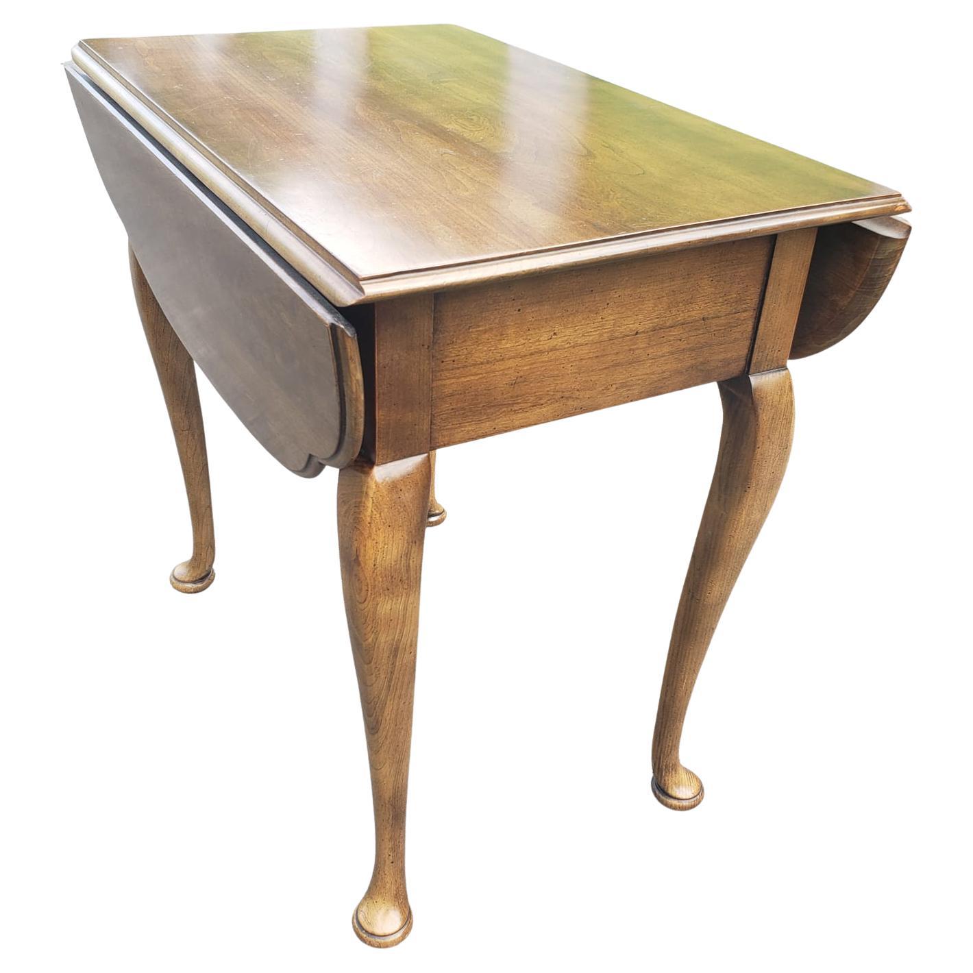 Statton Trutype walnut pembroke drop-leaf table.

17.5