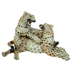 Statua vintage coppia di leopardi in ceramica smaltata