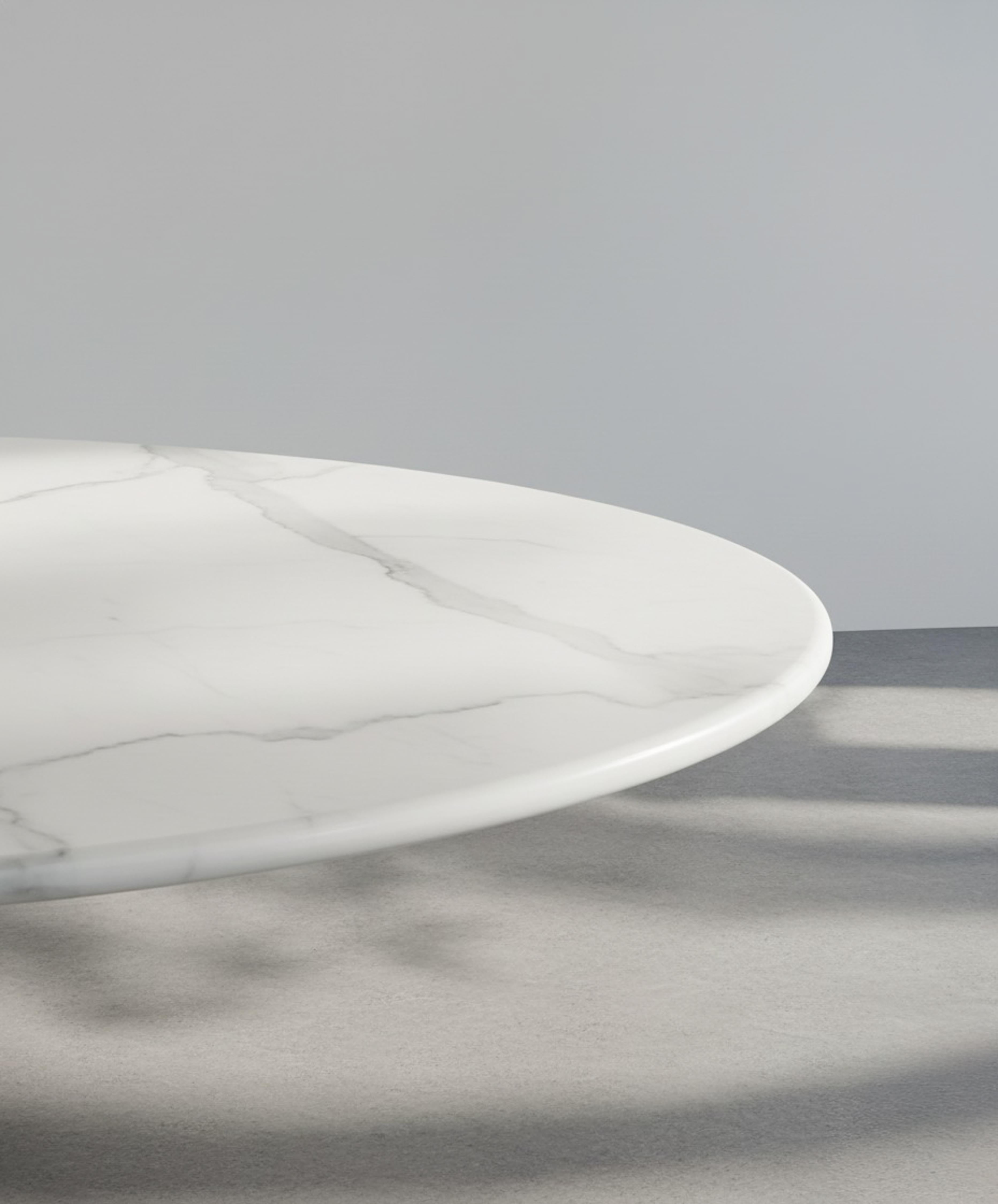 Statuary White Marble Dining Table – Fully Round Sculptural Stone Design

Material: Premium Statuary White Marble
Dimensions: 40 inches (100 cm) Diameter
Leg Model: Solid Statuary Marble Base
Customization: Available
Production Time: 2–3