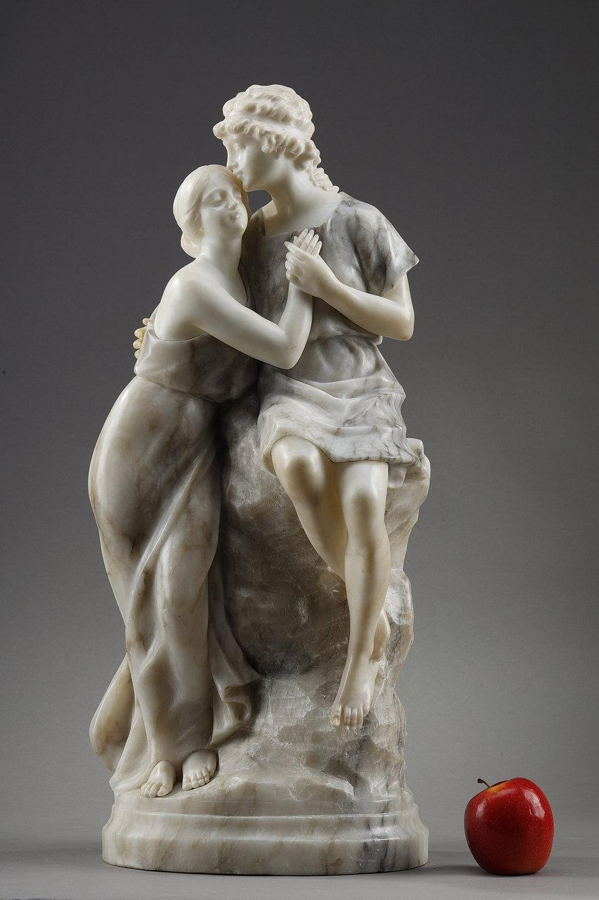 Statue in alabaster and marble representing an embracing couple, probably Helen and Paris. In order to create a contrast, the bodies of the figures are made of alabaster and the clothes of marble. The male figure, Paris, wears a short chiton (tunic)