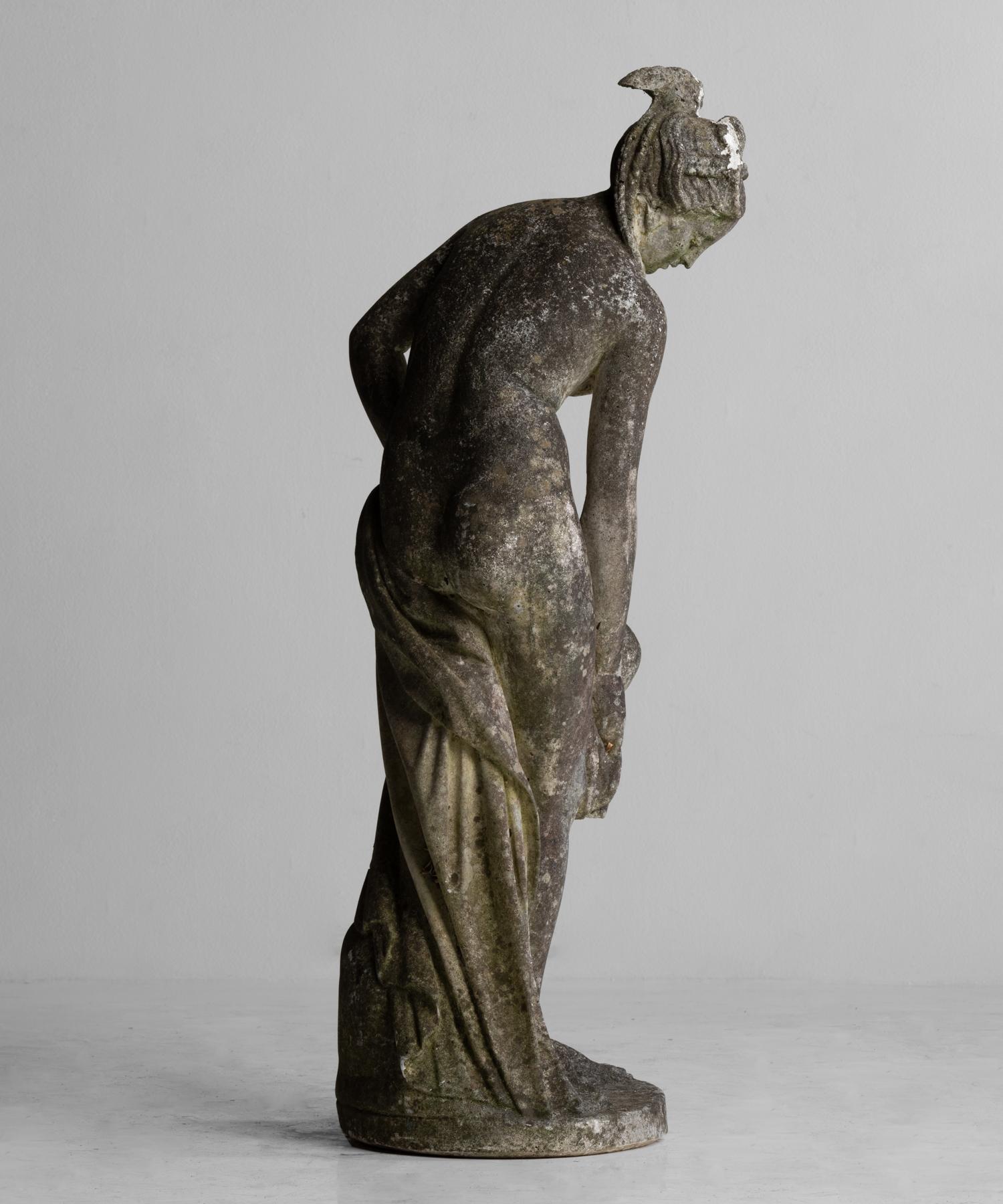 bathing woman statue