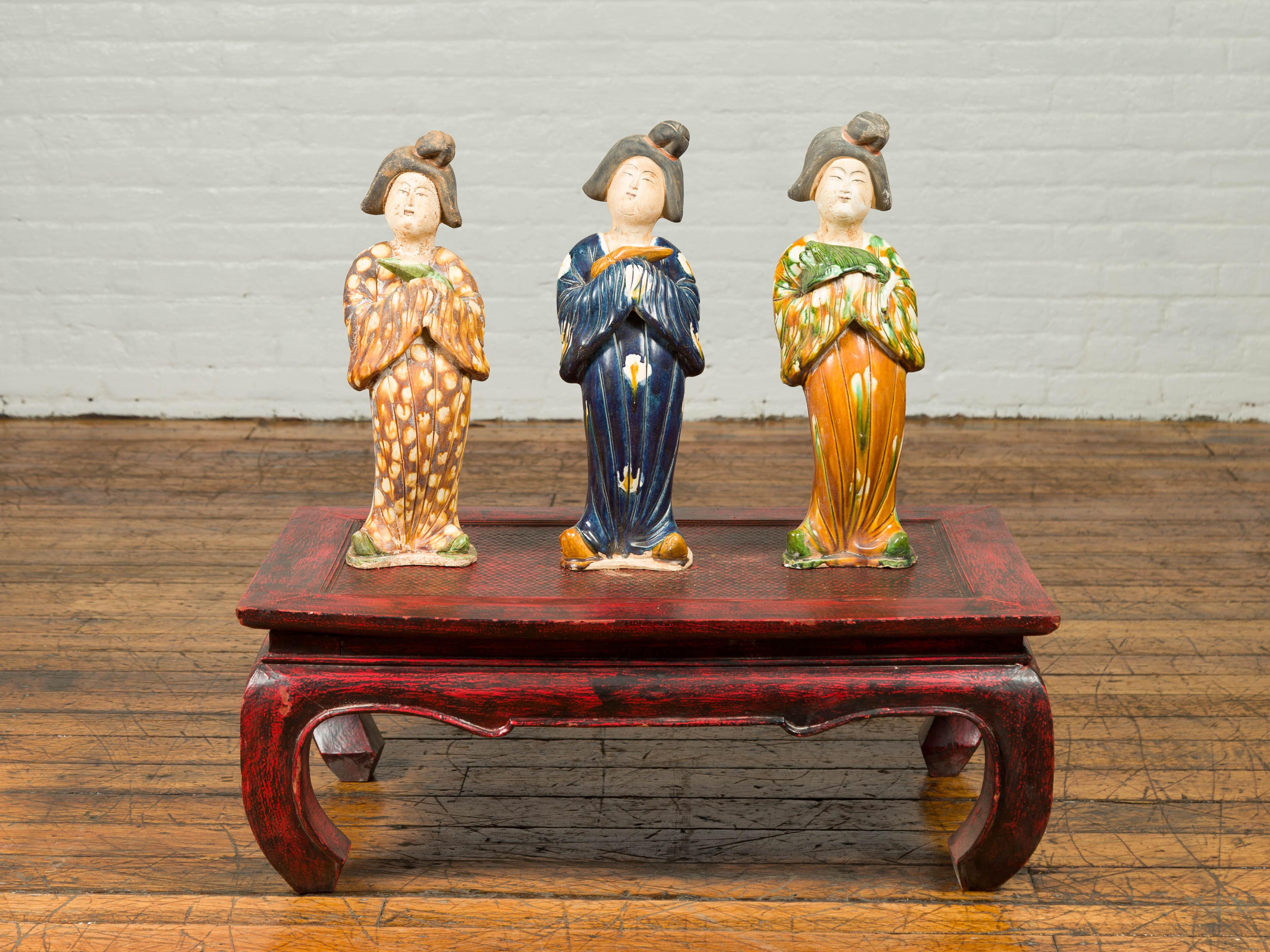 Ceramic Statue of a Court Lady Wearing Brown Patterned Kimono and Holding a Baby For Sale