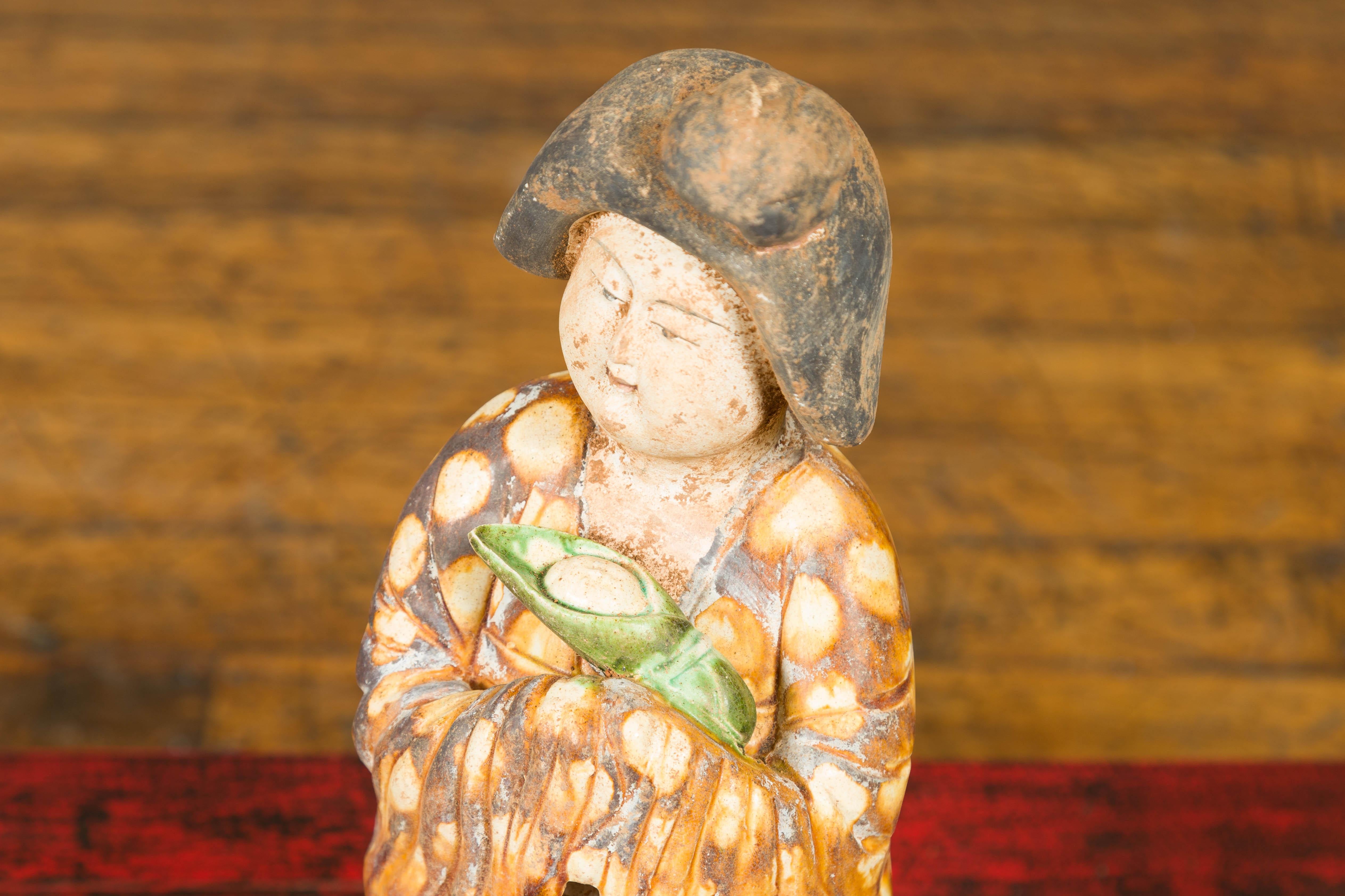 Glazed Statue of a Chinese Court Lady Wearing Brown Patterned Kimono and Holding a Baby For Sale