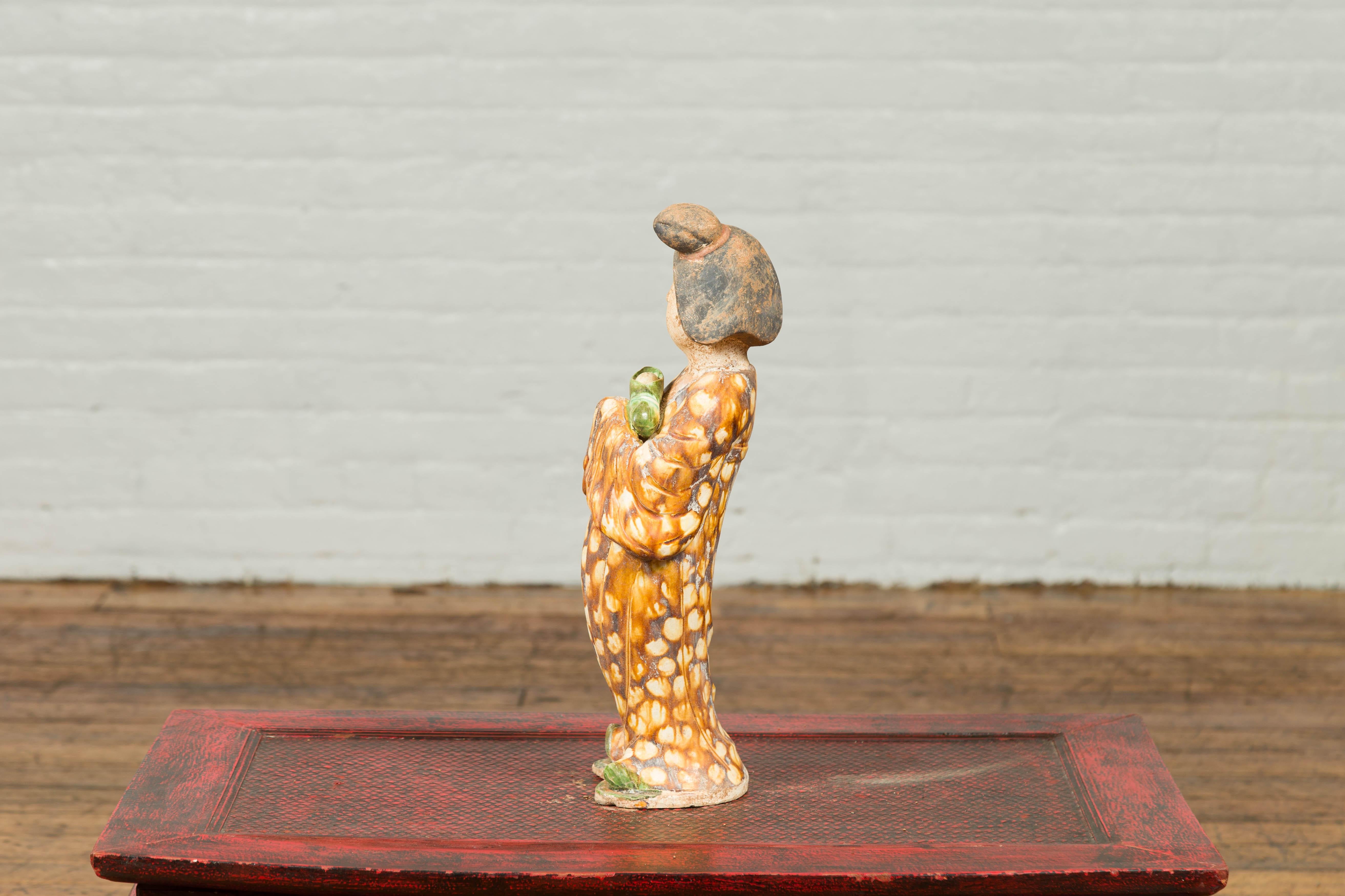 Glazed Statue of a Court Lady Wearing Brown Patterned Kimono and Holding a Baby For Sale