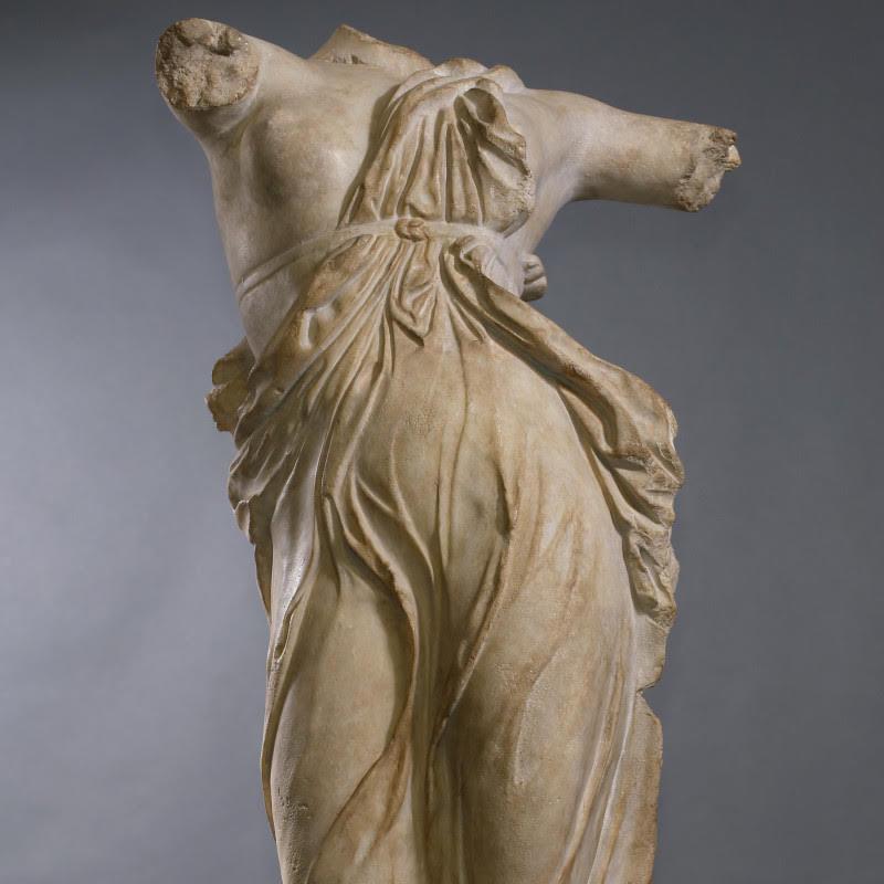 Statue of a Dancer in the taste of Antiquity, 20th century.

Sculpture representing a dancer in the taste of Antiquity, in composite material, 20th century.    
h: 111cm , w: 39cm, d: 25cm