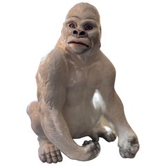 Statue of a Seated Gorilla Signed "Ronzan," 1950s, in White Ceramic
