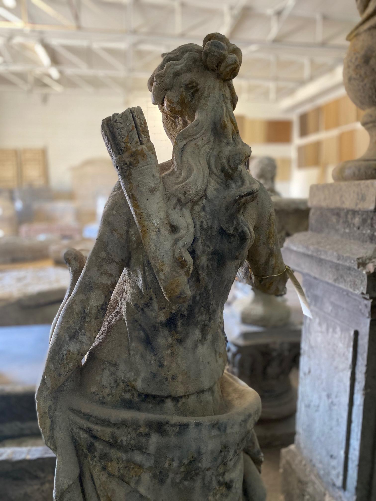 Limestone Statue of a Woman Archer