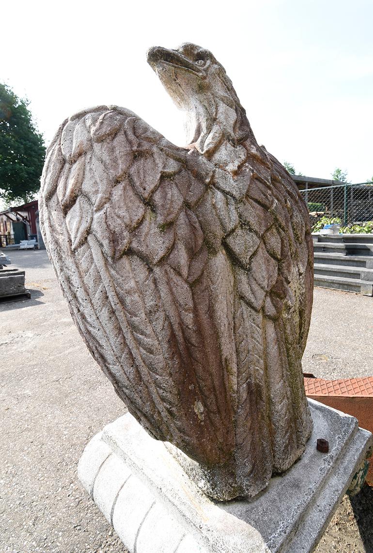 Cement Statue of an Eagle on a Pedestal