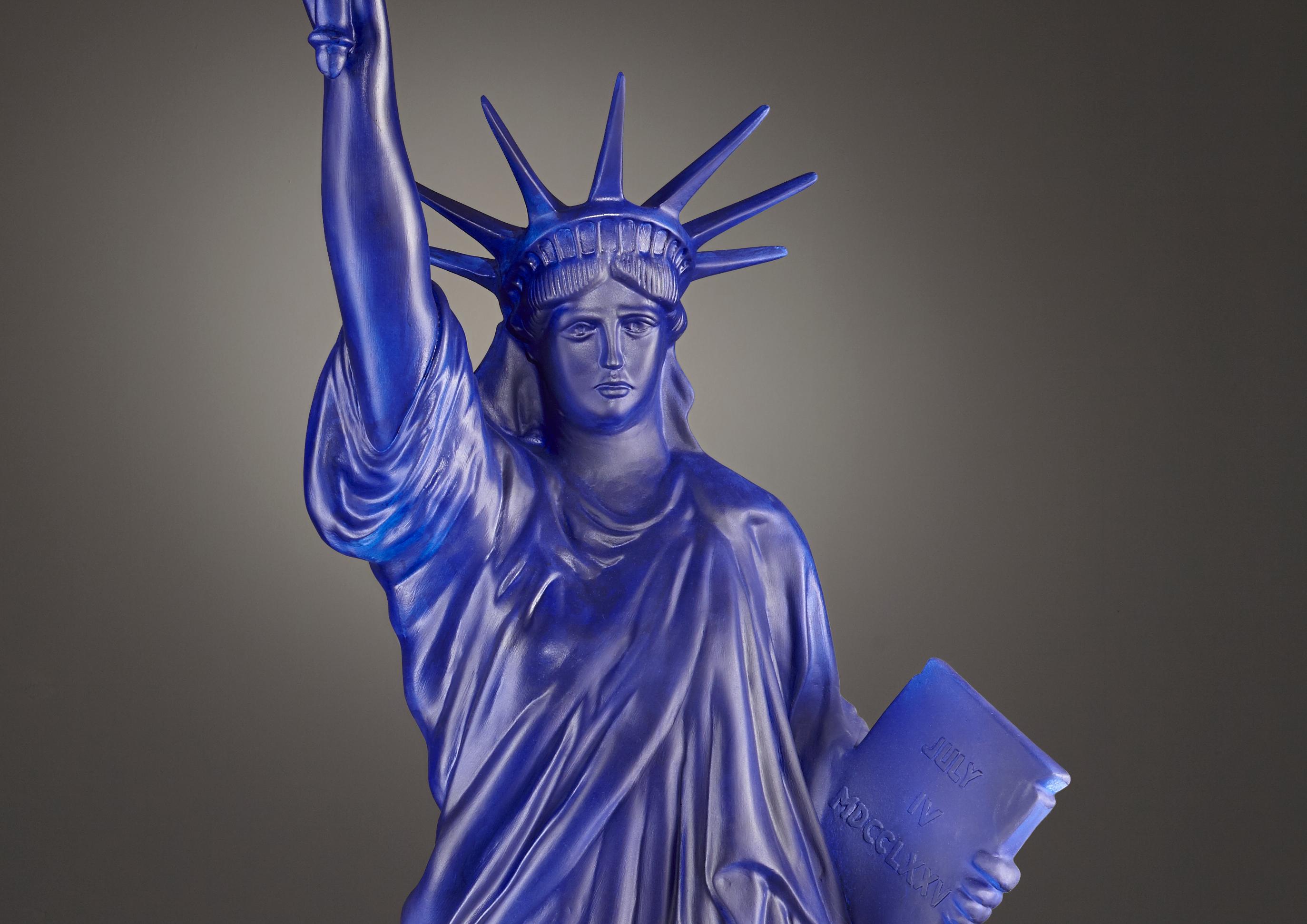 Unique Statue of Liberty in resin tainted in blue Klein with and enlightened opaline glass flame.
France, 2010.