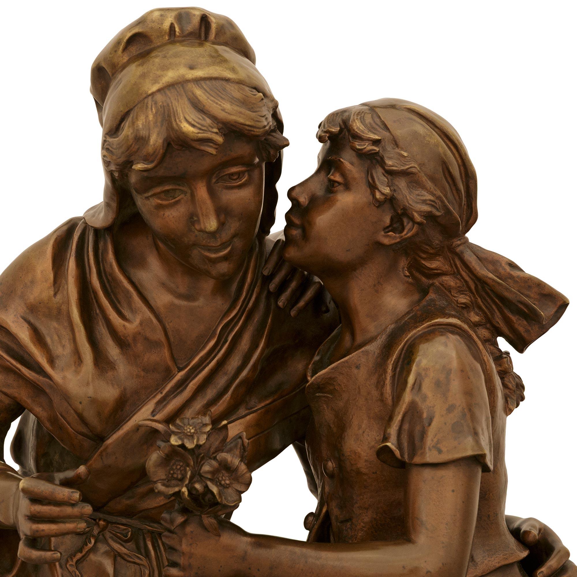 Patinated statue titled Fête de la Petite Mère, signed by Émile Nestor Joseph Carlier For Sale