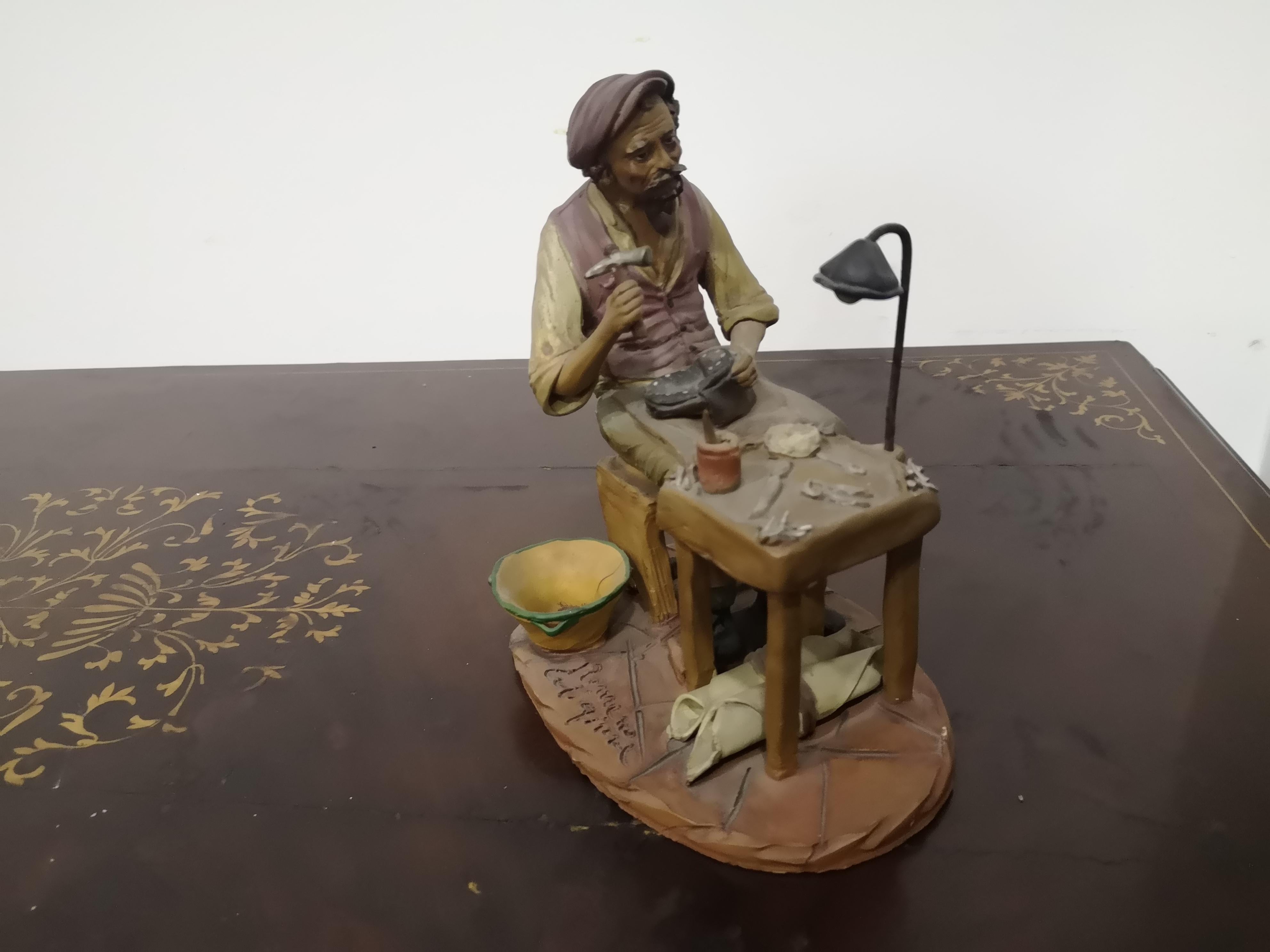 Beautiful Caltagirone figurine by Gaetano Romano from the 1960s
polychrome terracotta depicting a cobbler in his everyday life.
The figurine measures:
Height       cm 20
Length 17 cm
Width cm  12