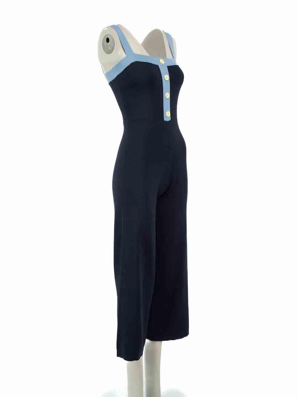 CONDITION is Very good. Minimal wear to jumpsuit is evident. Minimal wear to the front button with small chip on this used STAUD designer resale item.
 
Details
Blue
Viscose
Jumpsuit
Sleeveless
Square neckline
Front buttons accent
Knitted and