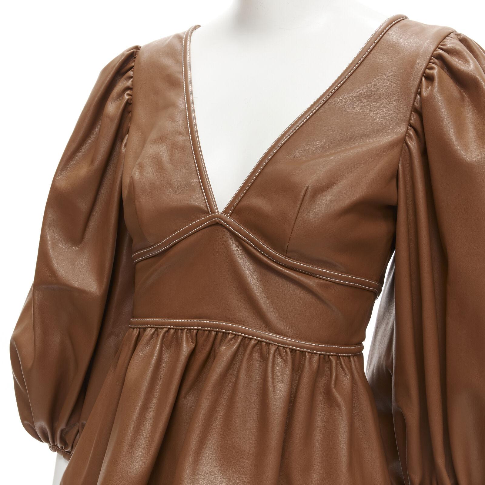 STAUD Luna tan brown vegan faux leather plunge neck puff sleeve top US0 XS
Reference: AAWC/A00108
Brand: Staud
Model: Luna
Material: Faux Leather
Color: Brown
Pattern: Solid
Lining: Unlined
Extra Details: Button back. Self tie at nape.
Made in: