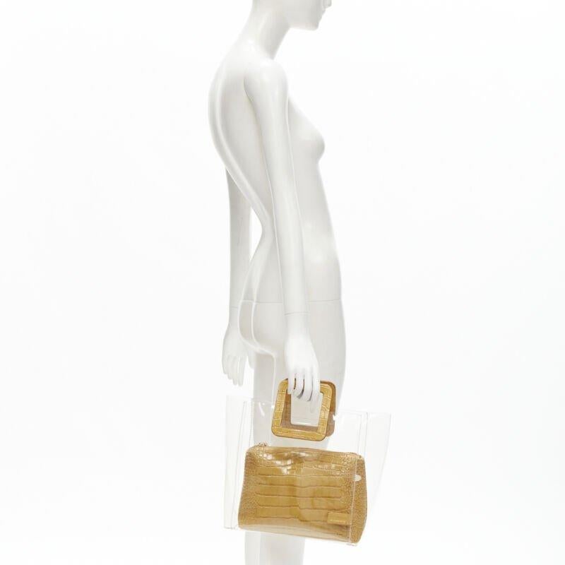 STAUD Shirley yellow stamped scaled leather zip pouch handle clear PVC tote bag
Reference: ANWU/A00006
Brand: Staud
Material: PVC
Color: Yellow
Pattern: Solid
Closure: Zip
Lining:  Leather
Extra Details: Removable mock croc leather zip