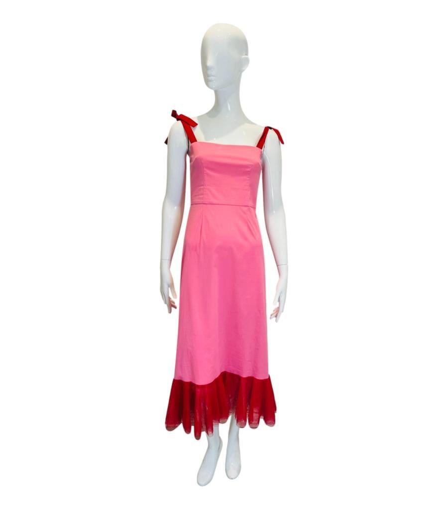 Staud Tulle-Trimmed Cotton Dress

Pink 'Langdon' dress crafted in cotton poplin and designed with red tulle hem and bow-tie straps.

Featuring mid-calf length and concealed zip closure to rear. Rrp £225

Size – 4US

Condition – Very