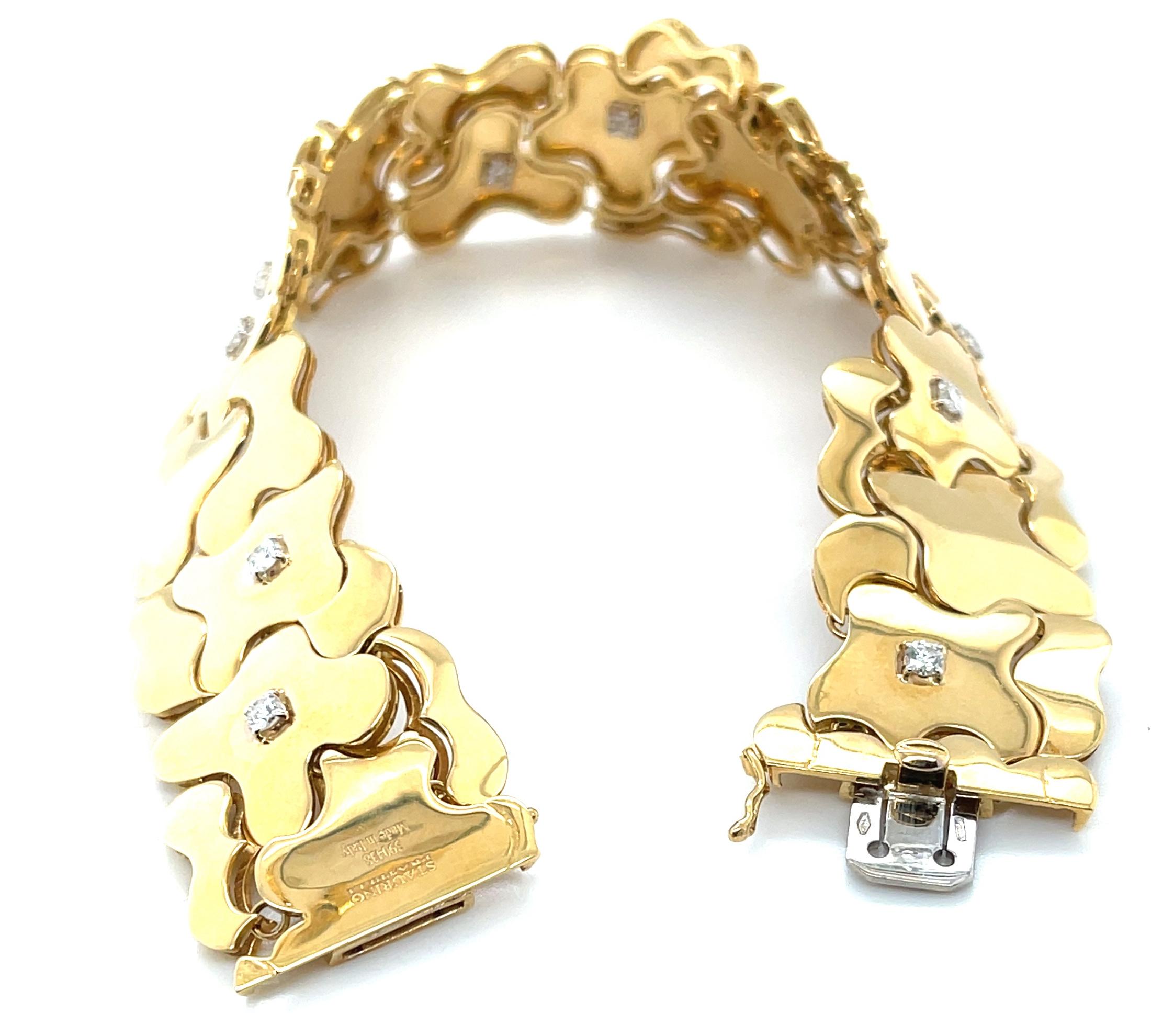 
This stunning bracelet was handcrafted in Italy by Staurino Fratelli. It is high-fashion and elegant and fun to wear! With an ingenious “puzzle” design, the 18k yellow gold links are expertly connected to fit together with just enough space between
