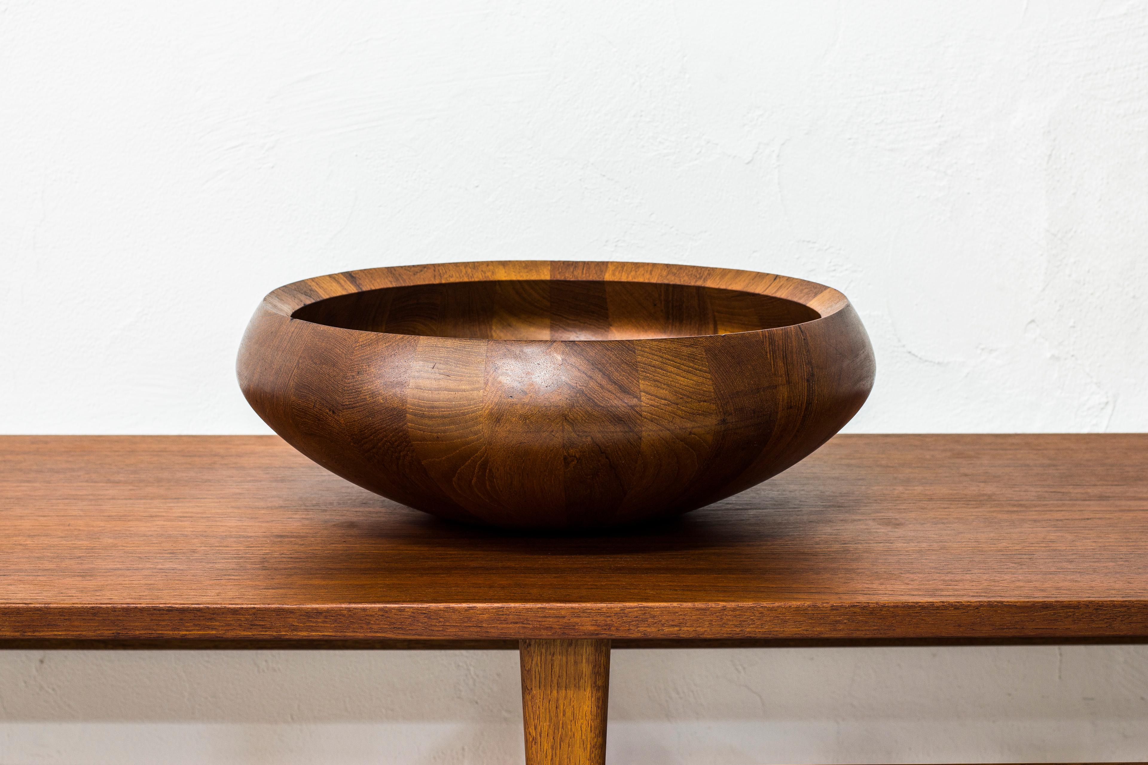 Large bowl designed by Jens Harald Quistgaard. Produced in Denmark by Dansk during the 1950s. Made from solid staved teak. Good vintage condition with signs of usage and patina.