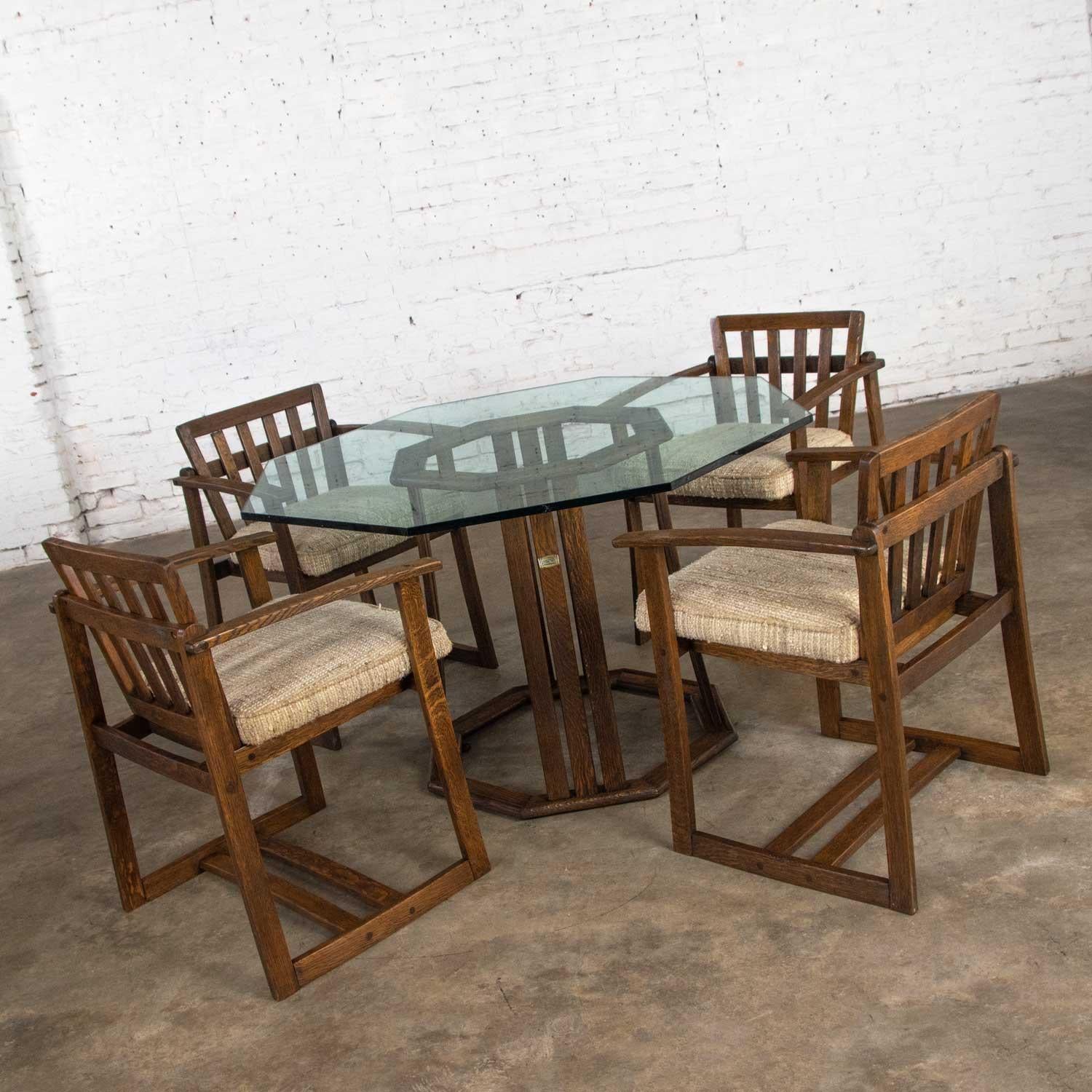 Handsome original StavOak dining table or game table and glass top with four (4) chairs designed by Jobie G. Redmond and made from Jack Daniels’ barrel staves. This set is in wonderful condition. The wood has been completely restored by our