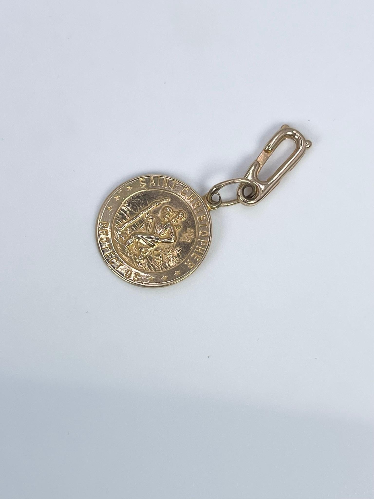 Saint Christopher pendant or charm made in 14KT yellow gold.

GRAM WEIGHT: 2.96gr
GOLD: 14KT yellow gold
SIZE: 41mm long x 18mm wide
ITEM#: 435-00019

WHAT YOU GET AT STAMPAR JEWELERS:
Stampar Jewelers, located in the heart of Jupiter, Florida, is a
