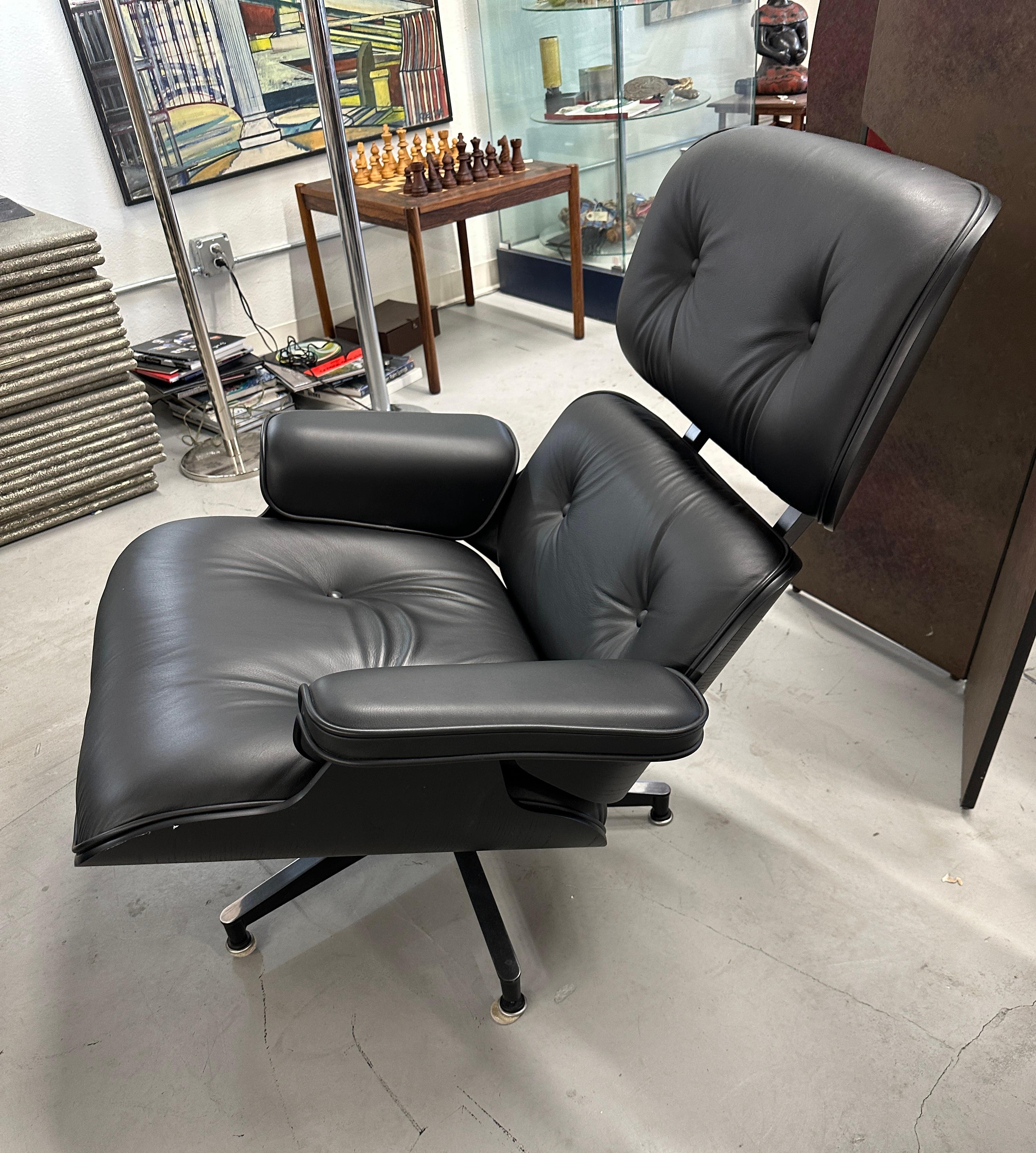 all black eames chair