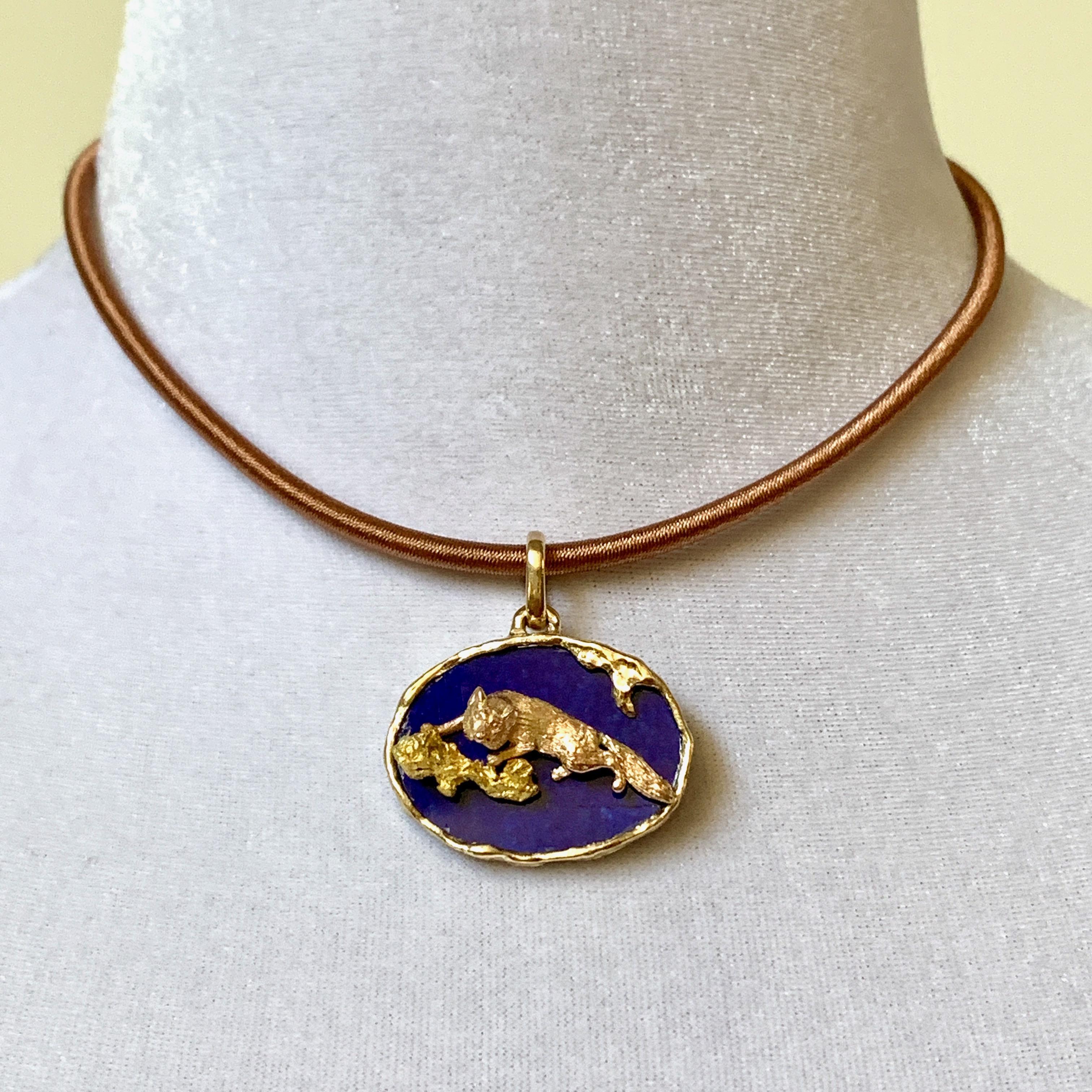 This one-of-a-kind pendant by Eytan Brandes features a sneaky little rose gold fox taking cover behind a 