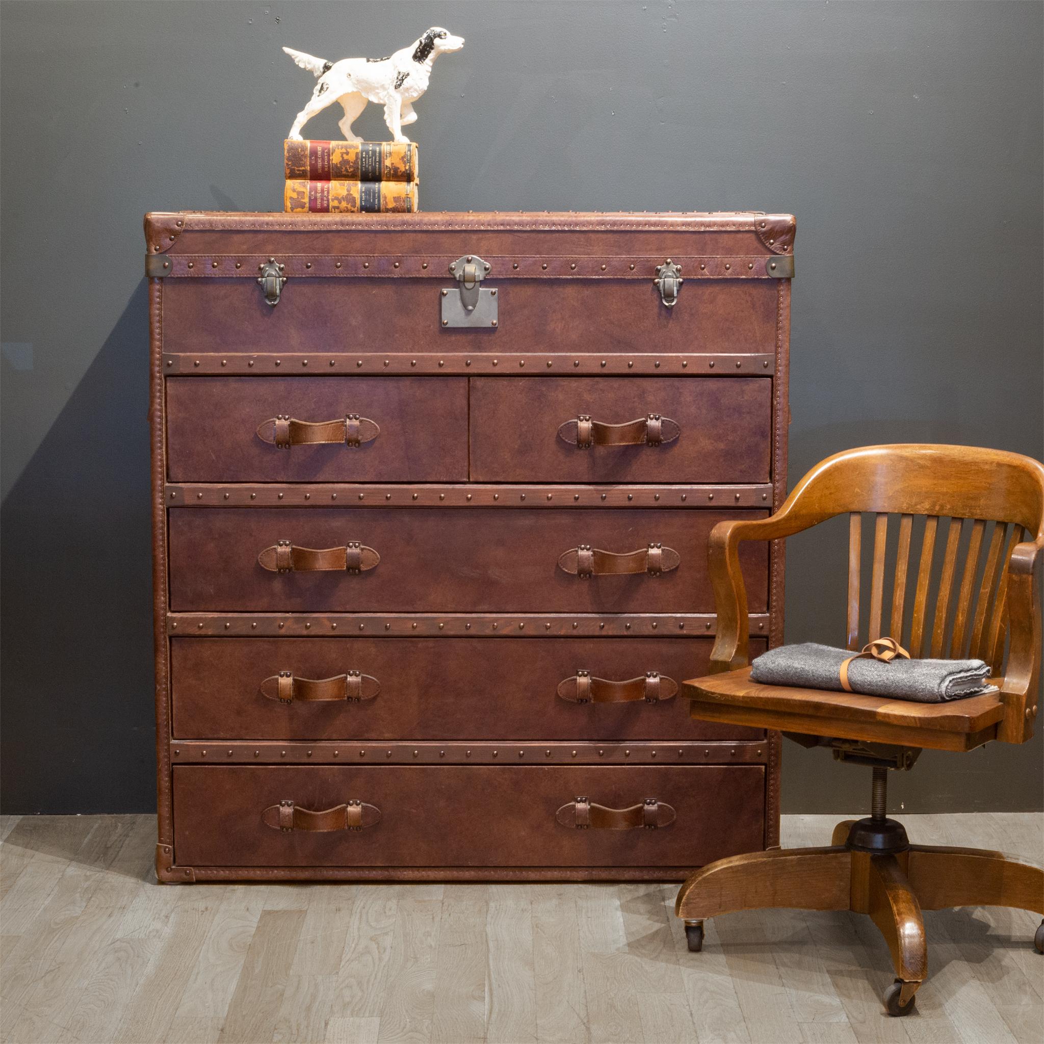 About

Antique style chest calls to mind the luggage once used by rail or ocean voyagers.

 Handmade of distressed vintage Cigar leather over a solid wood frame.
 Aniline-dyed leather has an antiqued, vintage look
 Accented with over 3,000