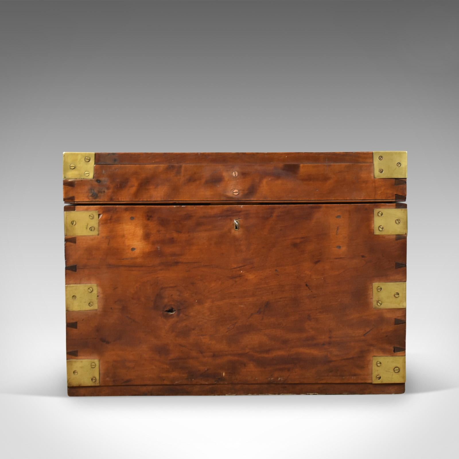 This is an antique steamer chest of marine interest, an English travel or ship's trunk by the prestigious Bristol firm of W Insall & Sons. A camphorwood chest from the late 19th century, circa 1870.

Robustly constructed in select