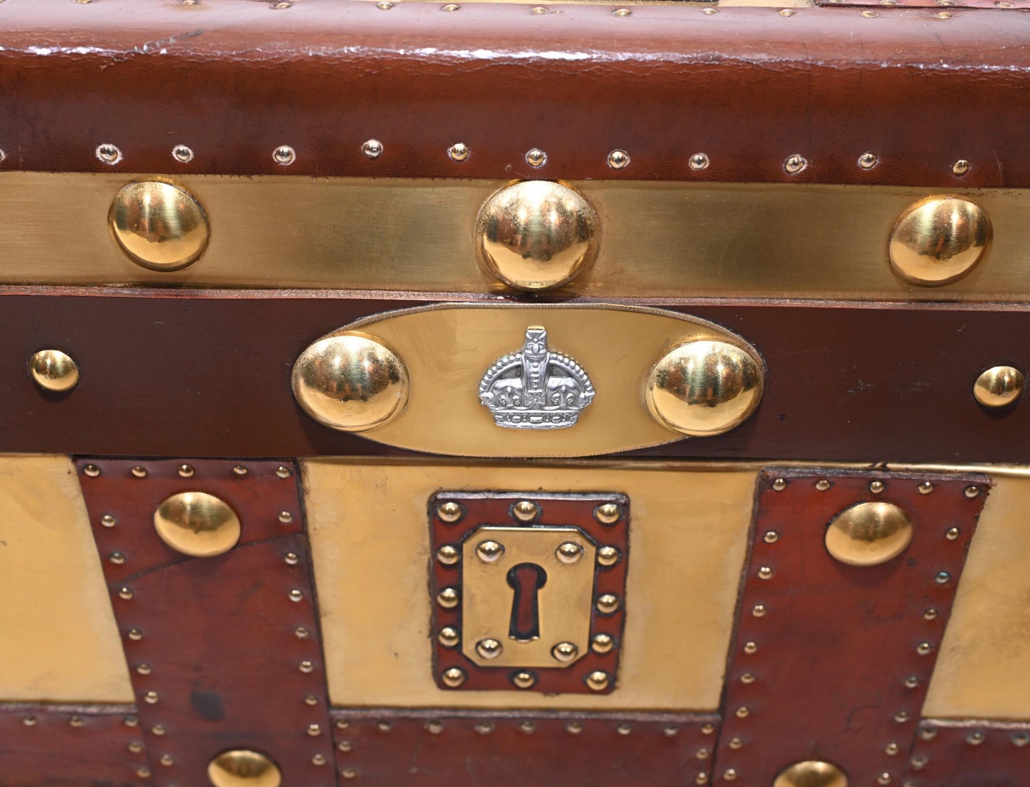 Classic large copper steamer trunk luggage trunk
Would make a great coffee table
Very eye catching colour scheme with copper overlaid by leather straps

Offered in great shape ready for home use right away
We ship to every corner of the