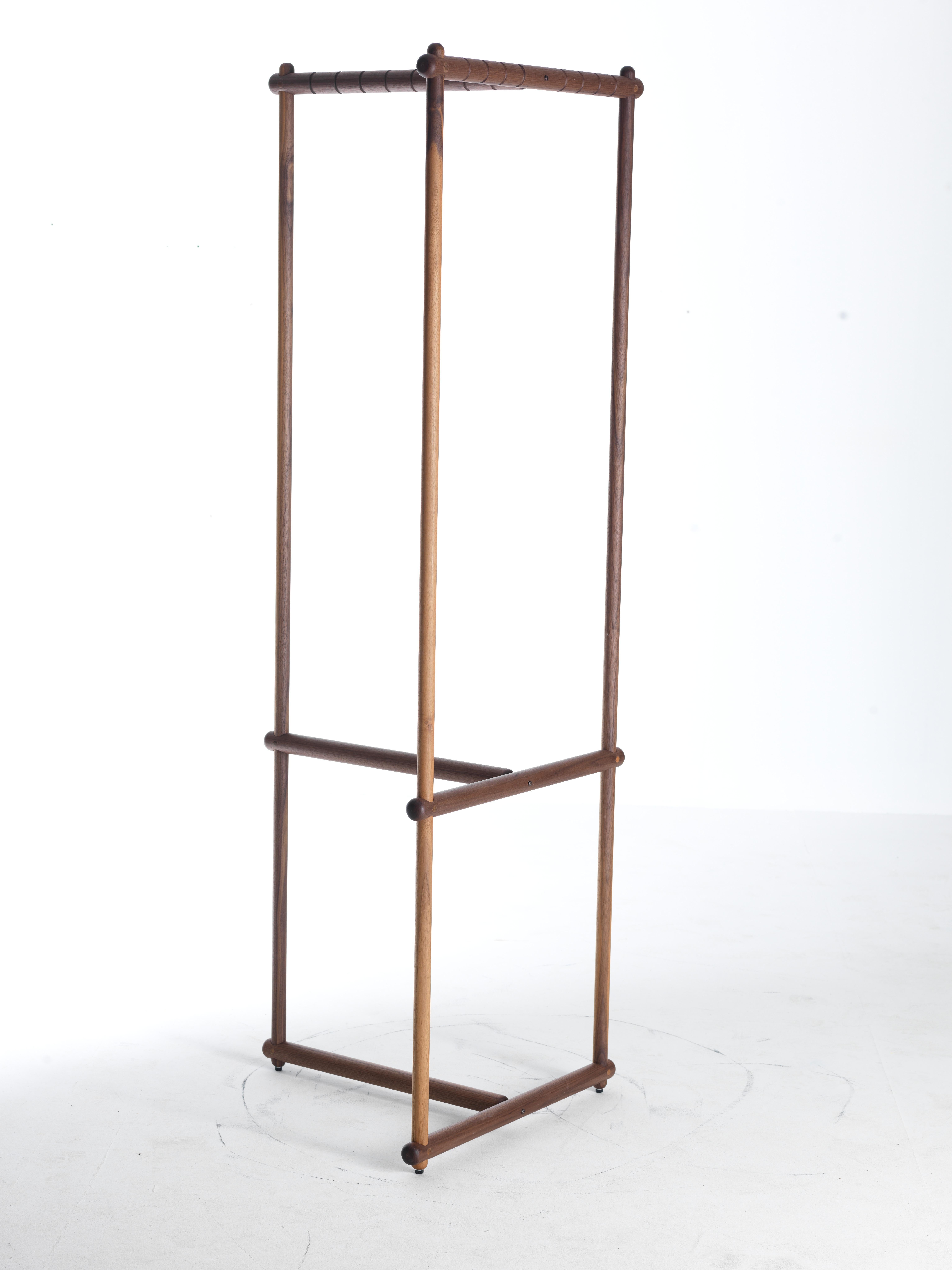 Stecco Coat Hanger by Dale Italia
Dimensions: D 55 x W 55 x H 180 cm.
Materials: Walnut.

The walnut veneer blockboard and drawers are made of solid walnut. Available in two different finishes: natural and grey walnut. Prices may vary. Please