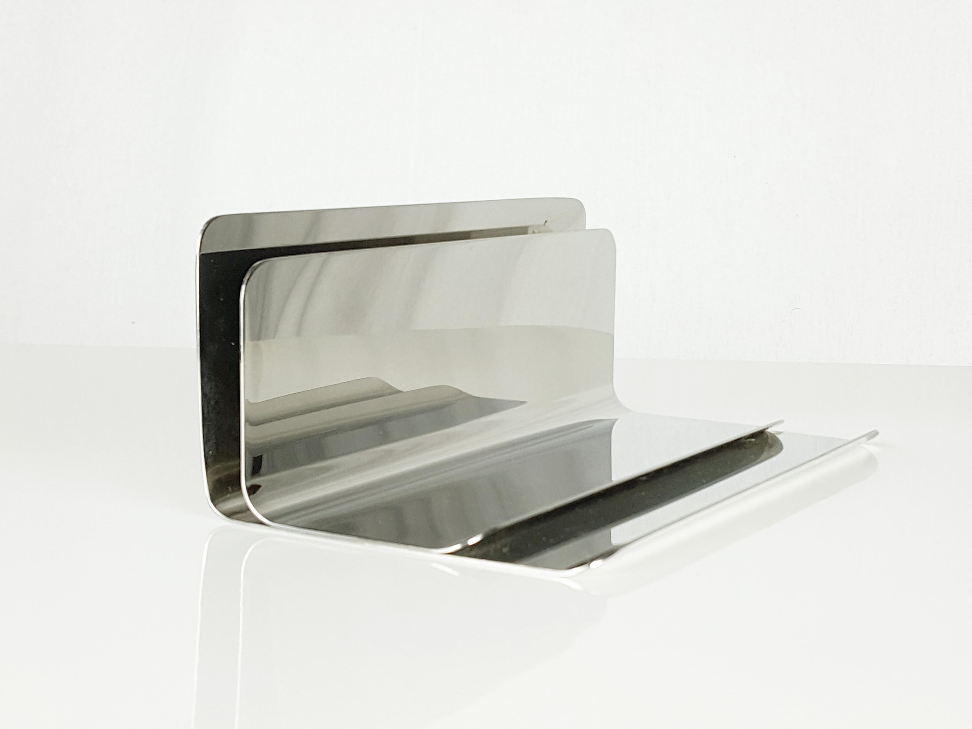 Ventotene desk organizer, model 3054A in polished steel designed by Enzo Mari for Danese Milano in 1964.
Good condition: this is a vintage item, not a brand new product. Signs of wear consistent with age and use; light scratches beneath the