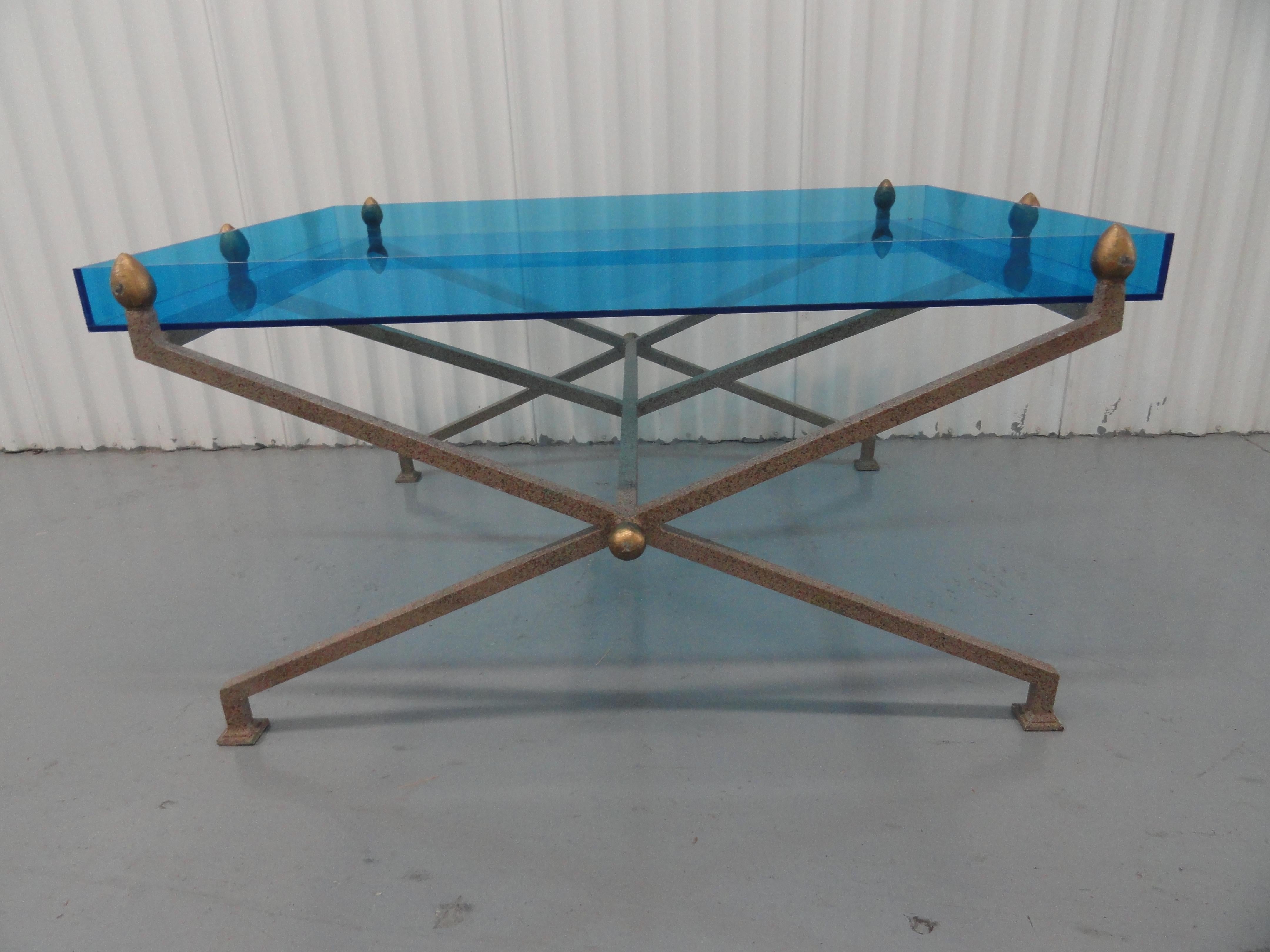 Steel base coffee table with custom blue perspex / acrylic tray top. Tray top holds a piece of glass for strength and to keep acrylic from scratching. Base is metal and heavy, sturdy. Classic x-leg form with center stretcher.