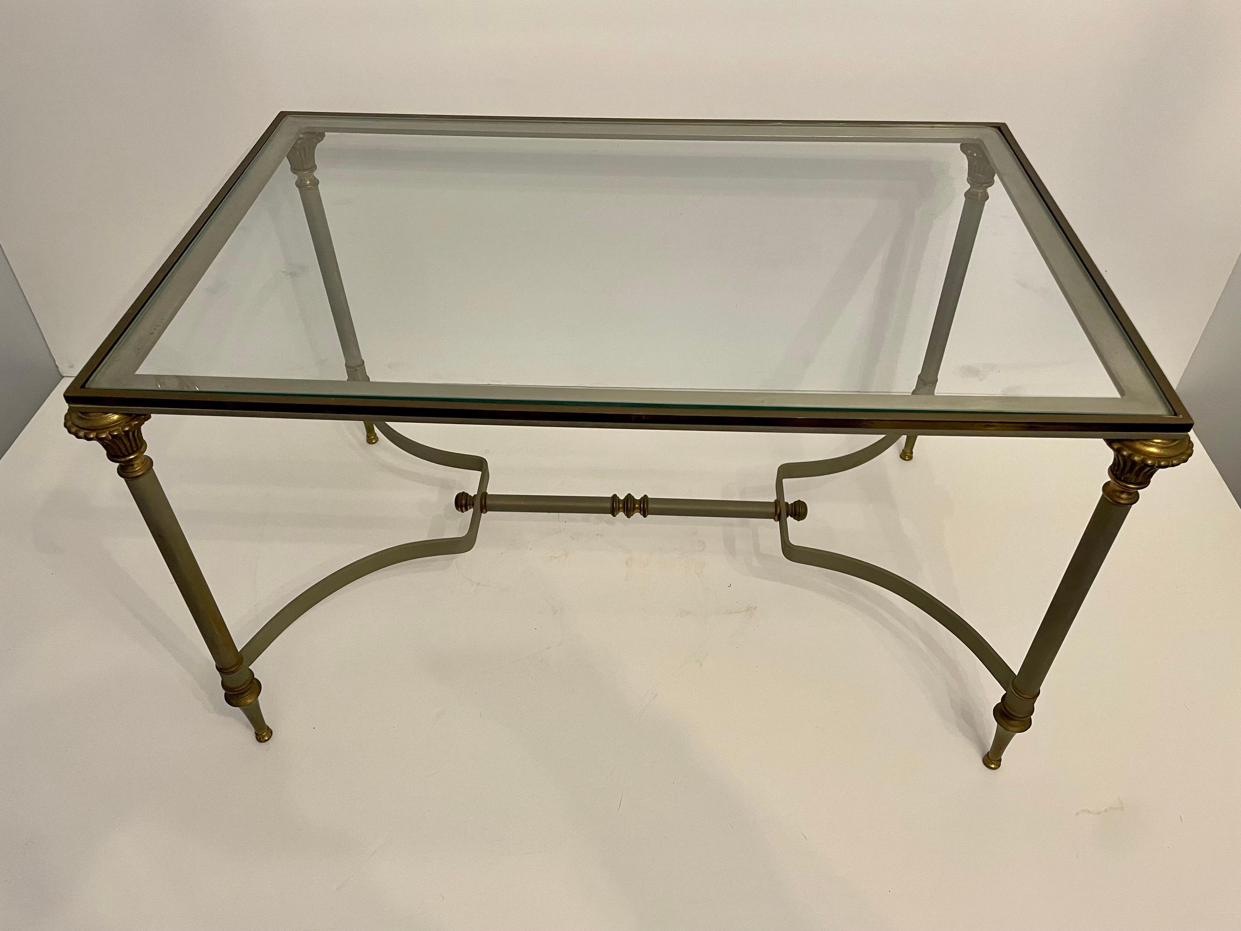 Steel and Brass Maison Jansen Style coffee table with inset glass top. Warm original patina, circa 1960s. 29